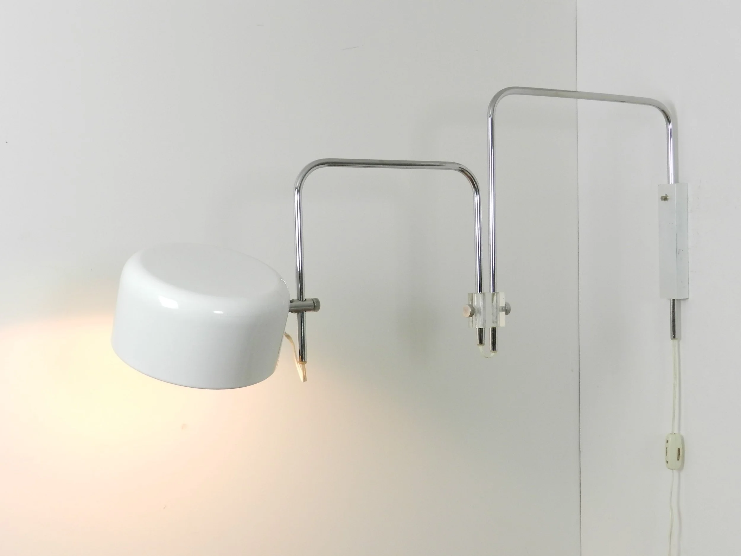 Modernist articulating wall lamp in the style of Joe Colombo.  Netherlands. 1970s.