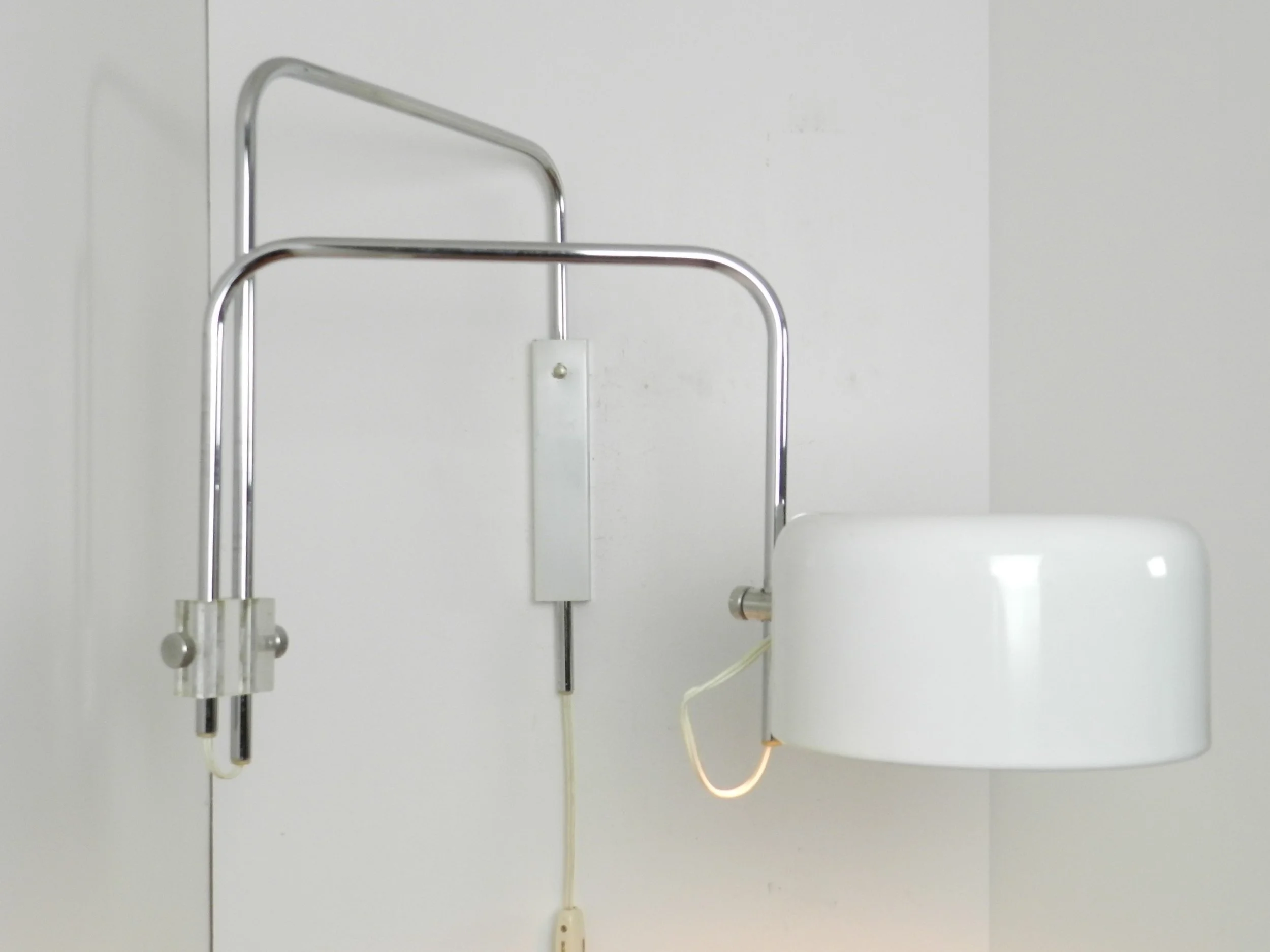 Modernist articulating wall lamp in the style of Joe Colombo.  Netherlands. 1970s.