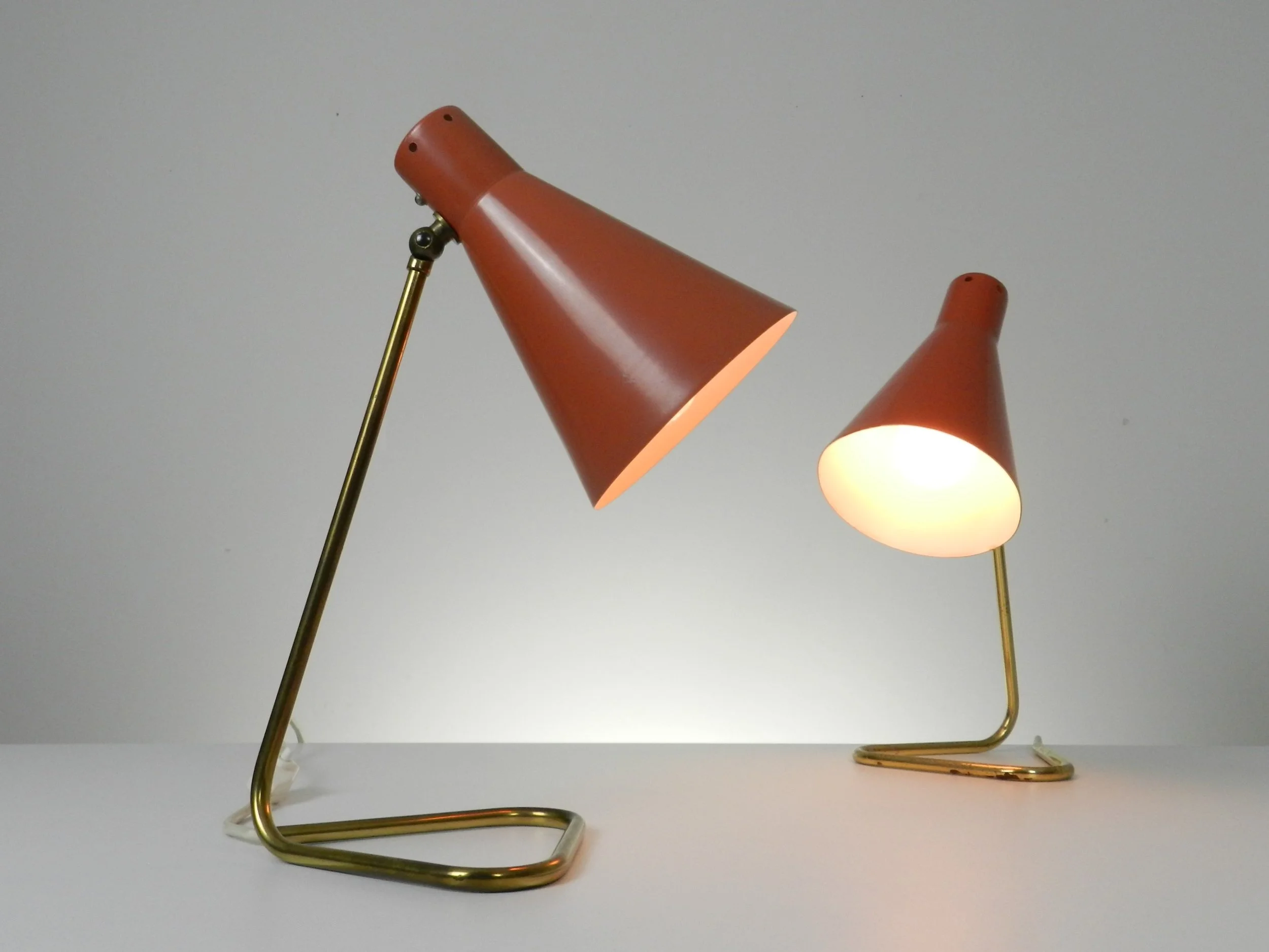 Pair of mid century lamps in the style of Stilnovo.  Italy, 1950s.