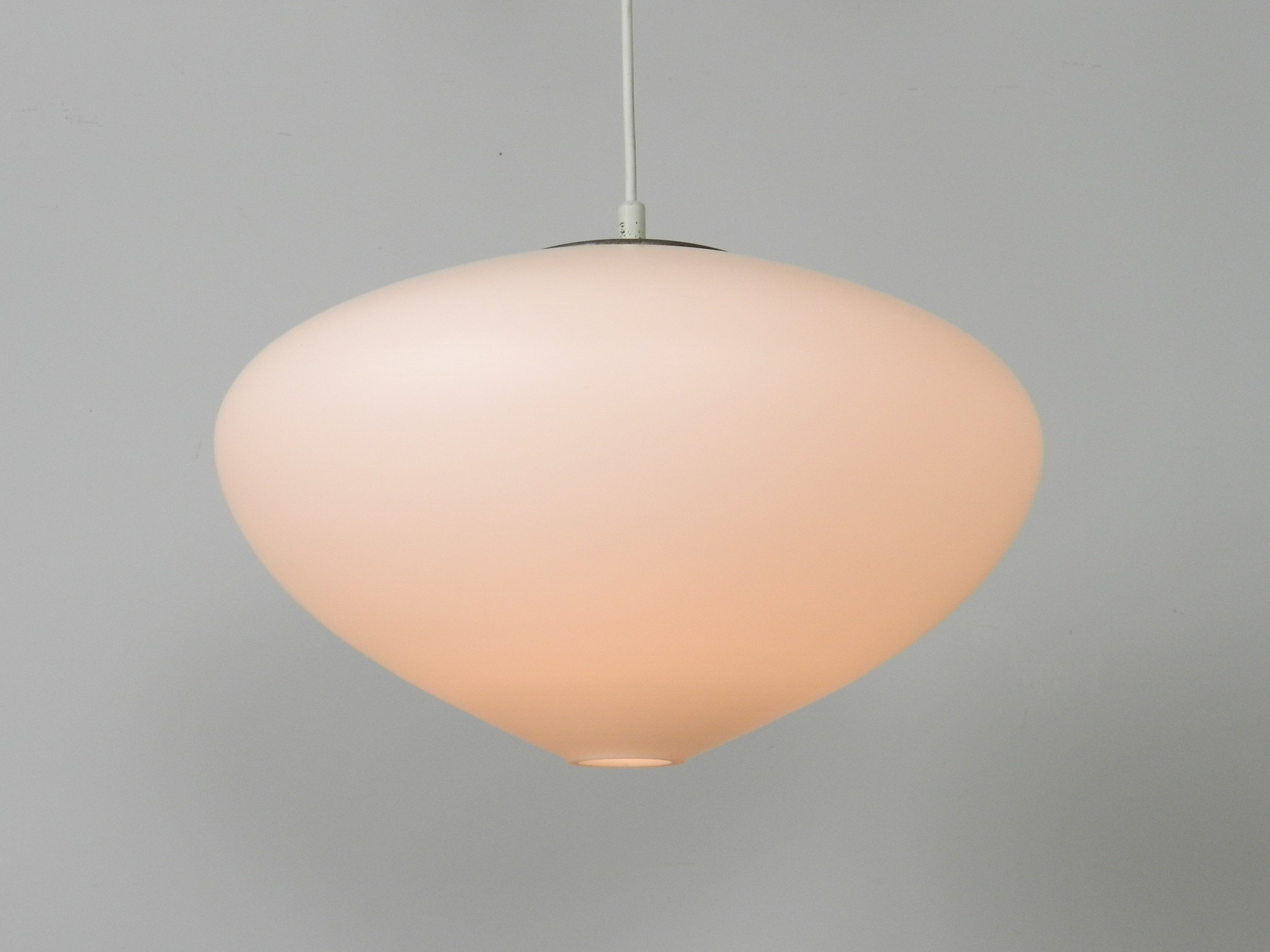 Large opaline glass pendant lamp by Raak.  Netherlands, 1960s.