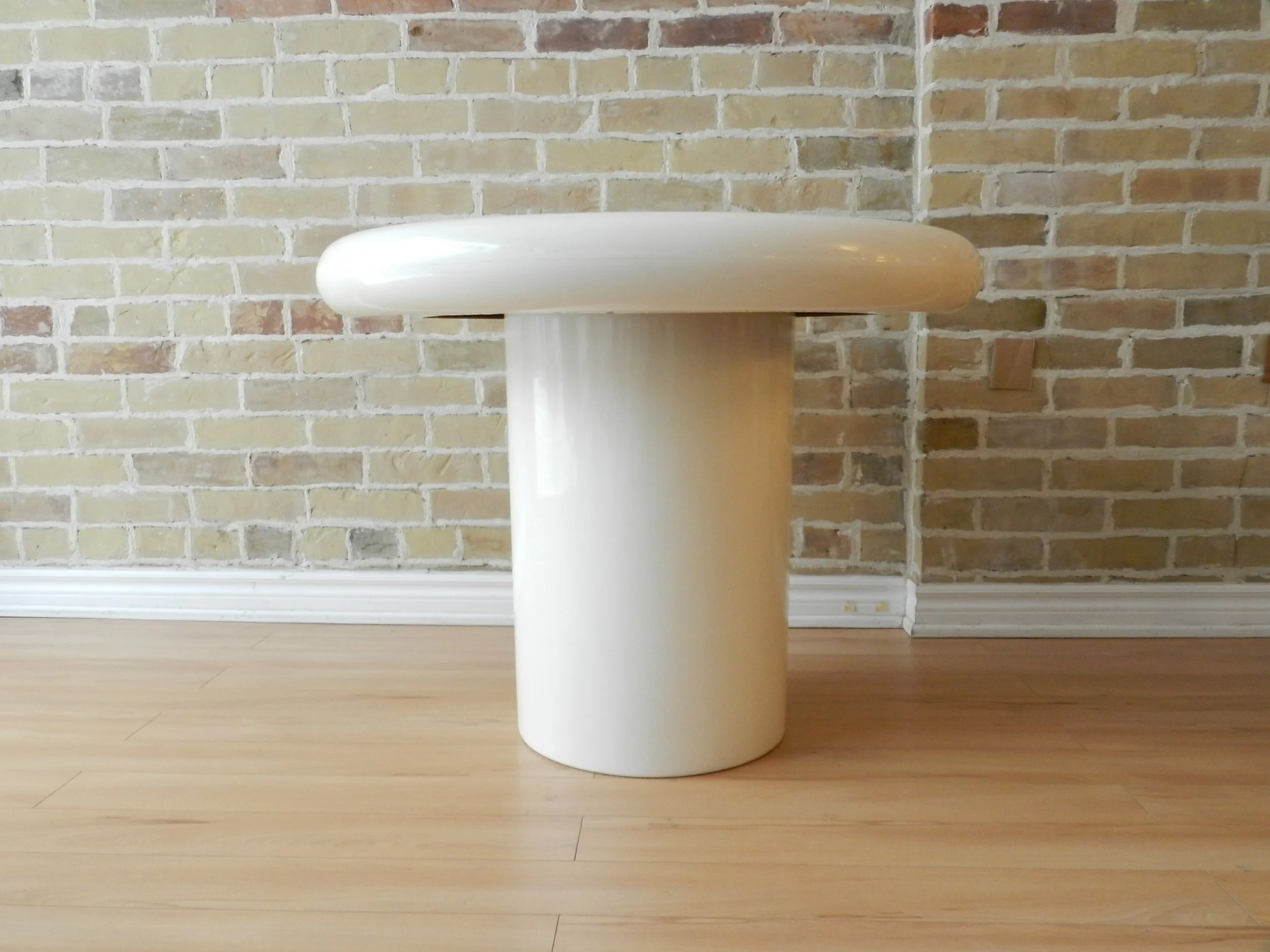 Space age dinette table in white fiberglass.  circa 1970s.