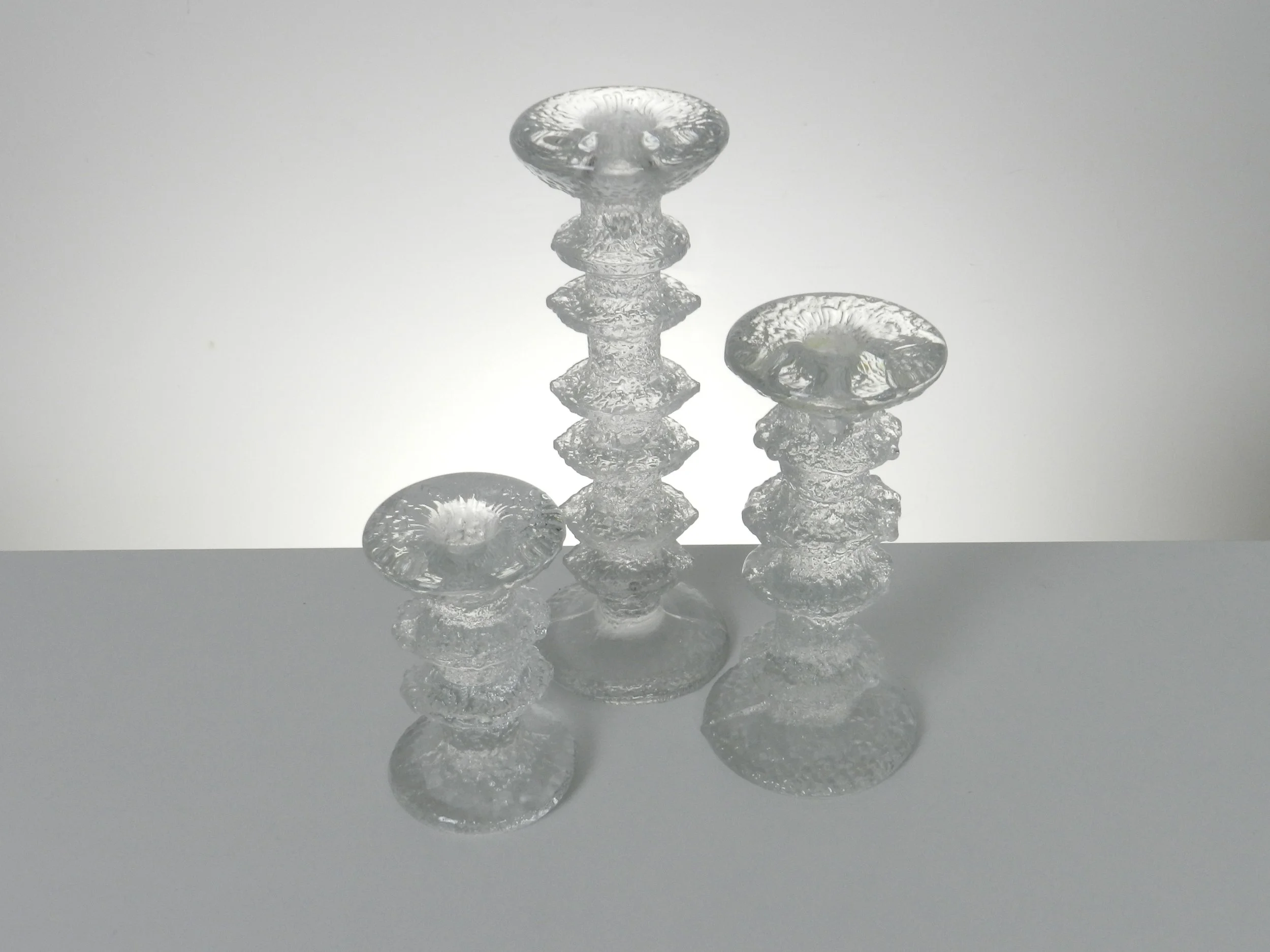Set of 3 Festivo crystal candleholders designed by Timo Sarpaneva for Iittala.  Finland, 1960s.