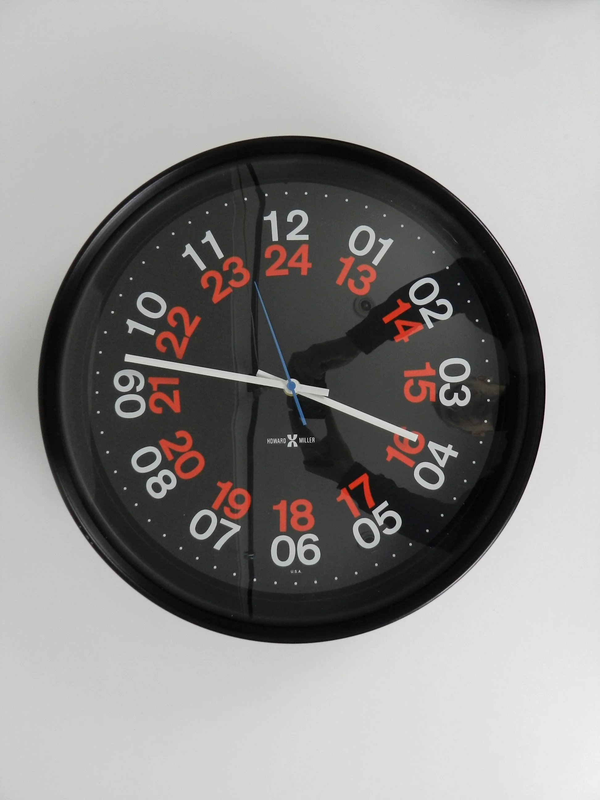 Vintage modernist large wall clock by Howard Miller Clock Co.  USA, 1970s.