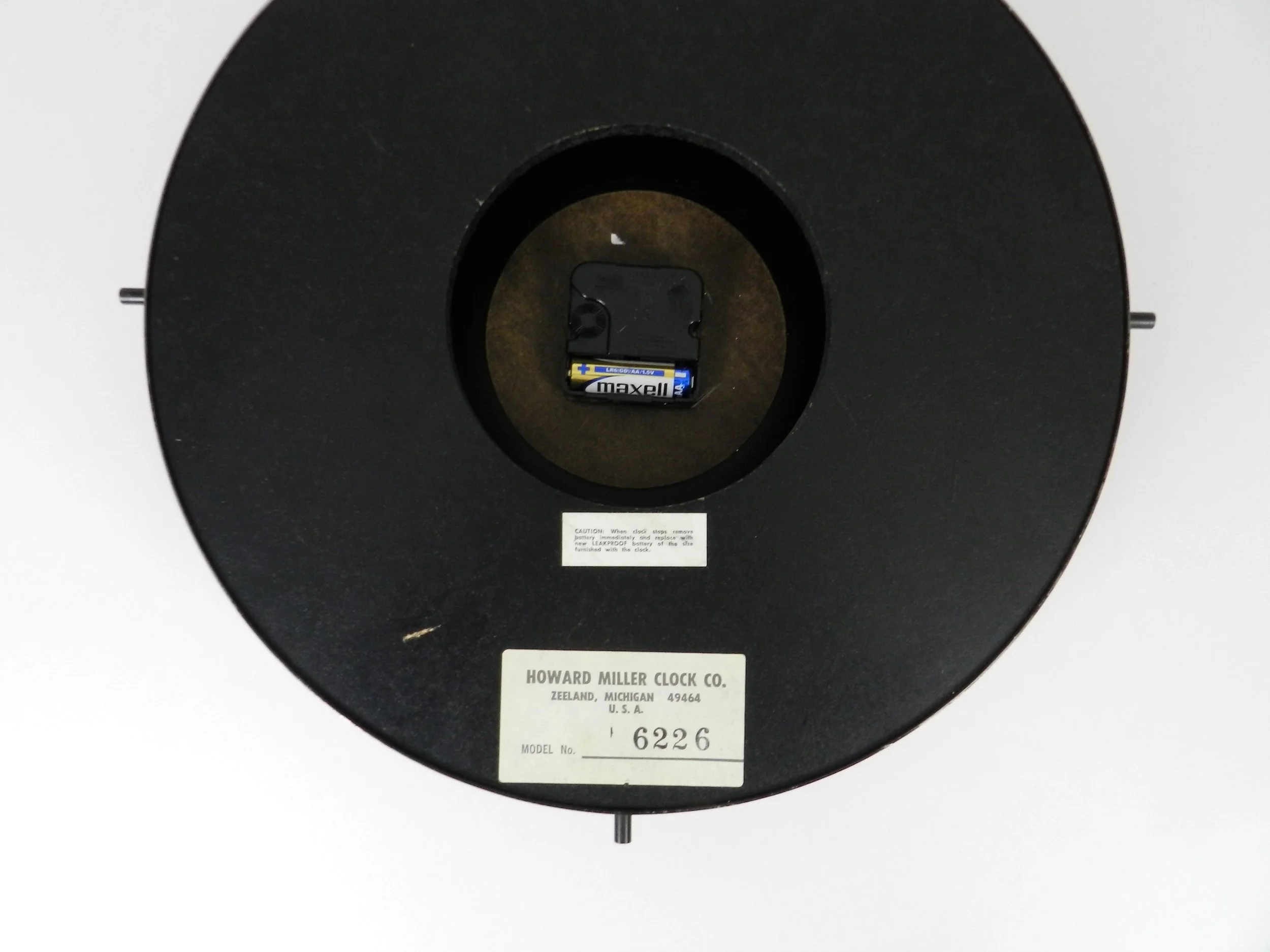 Vintage modernist large wall clock by Howard Miller Clock Co.  USA, 1970s.