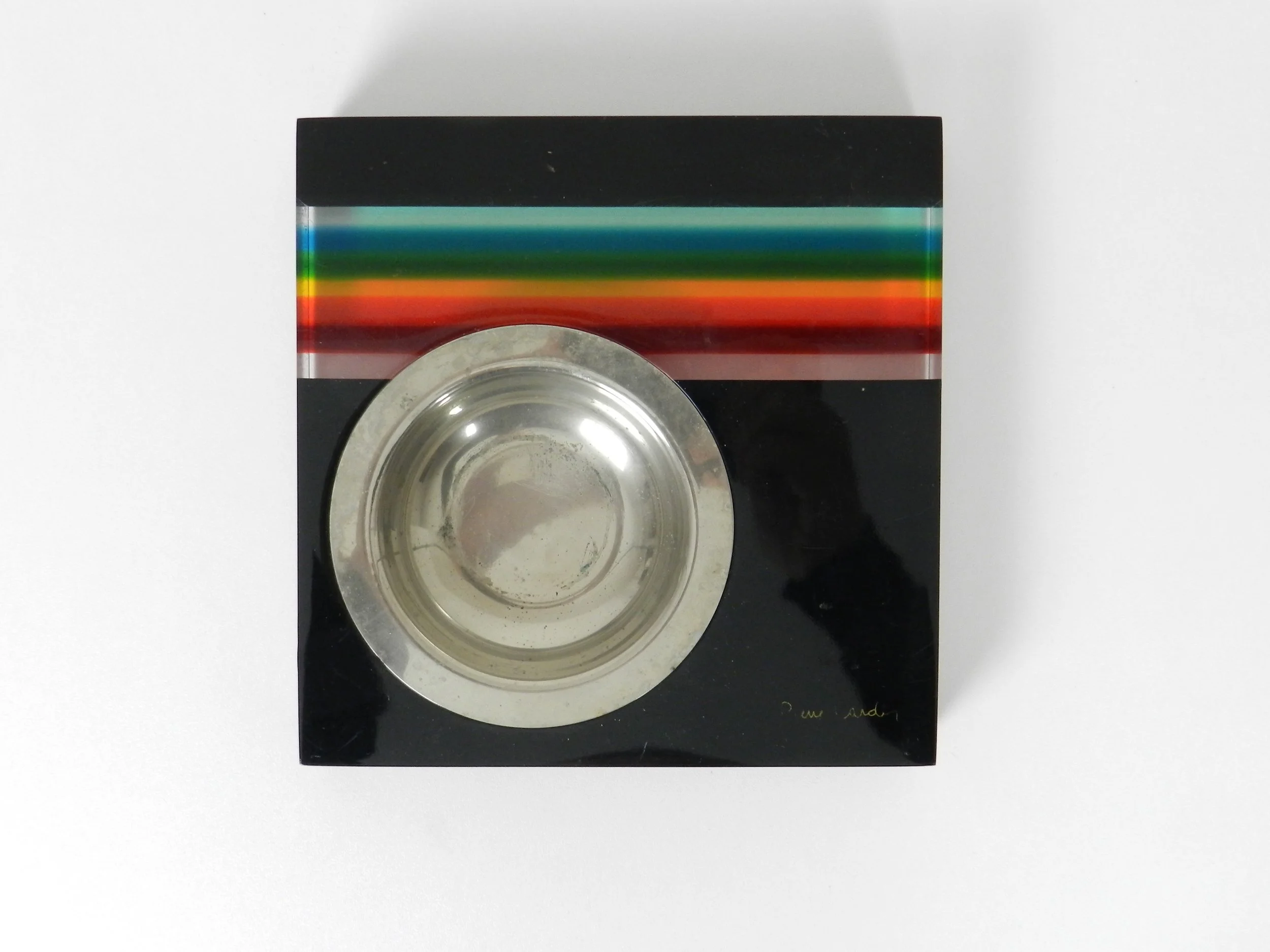 Striped lucite ashtray with steel liner designed by Pierre Cardin.  circa 1970s.