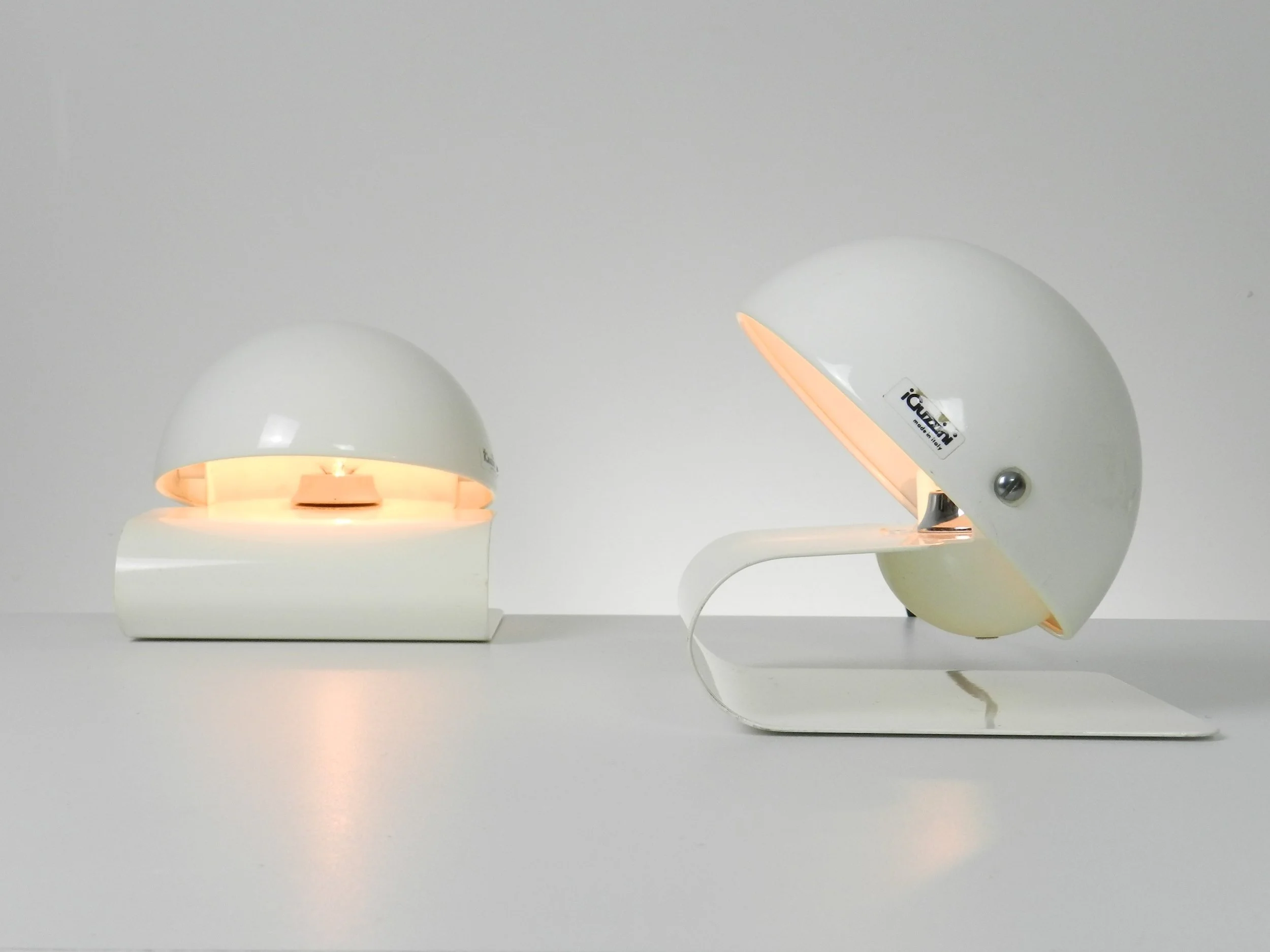 Pair of space age Bugia lamps designed by Giuseppe Cormio for Guzzini.  Italy, 1970s.