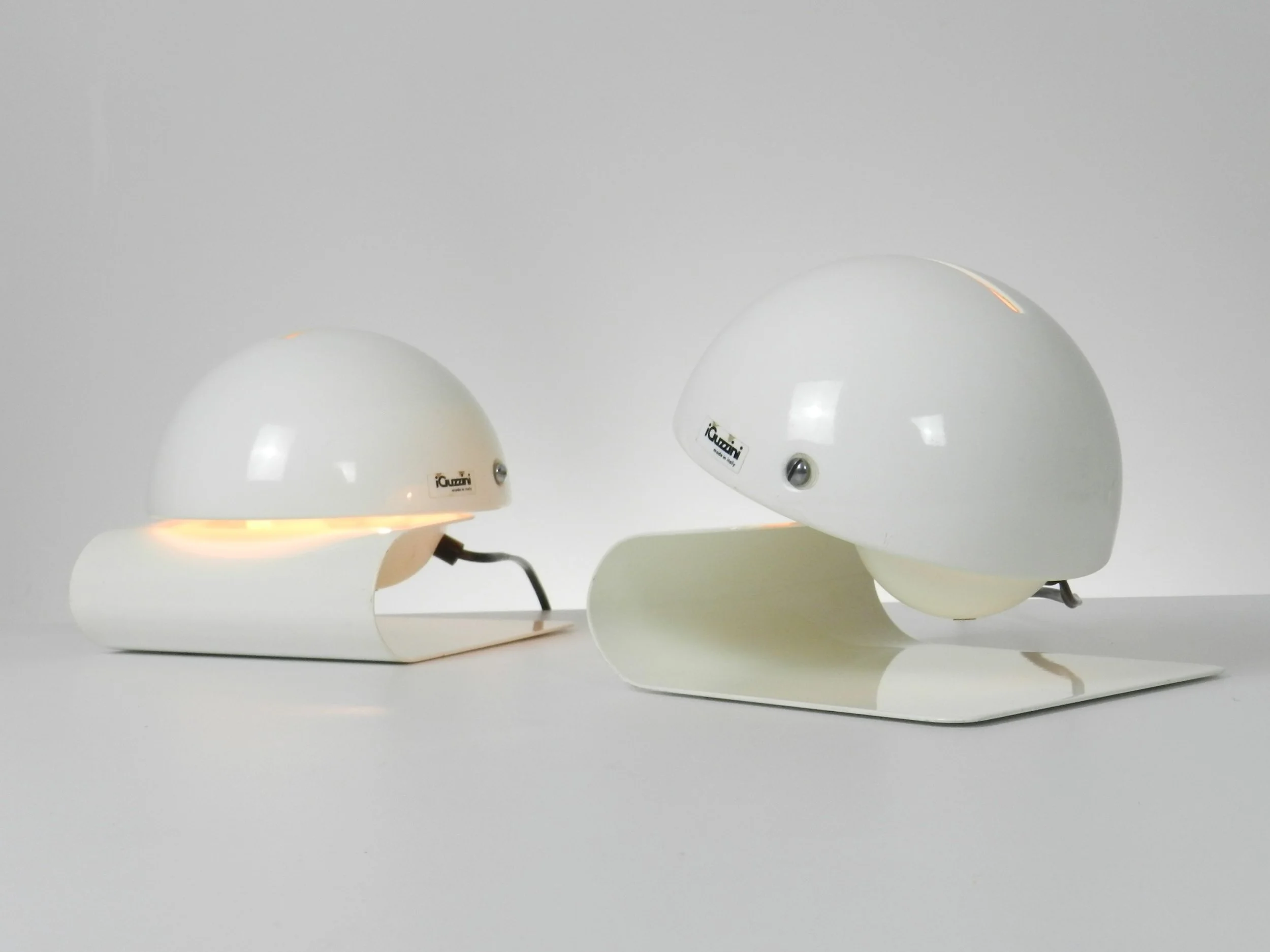 Pair of space age Bugia lamps designed by Giuseppe Cormio for Guzzini.  Italy, 1970s.