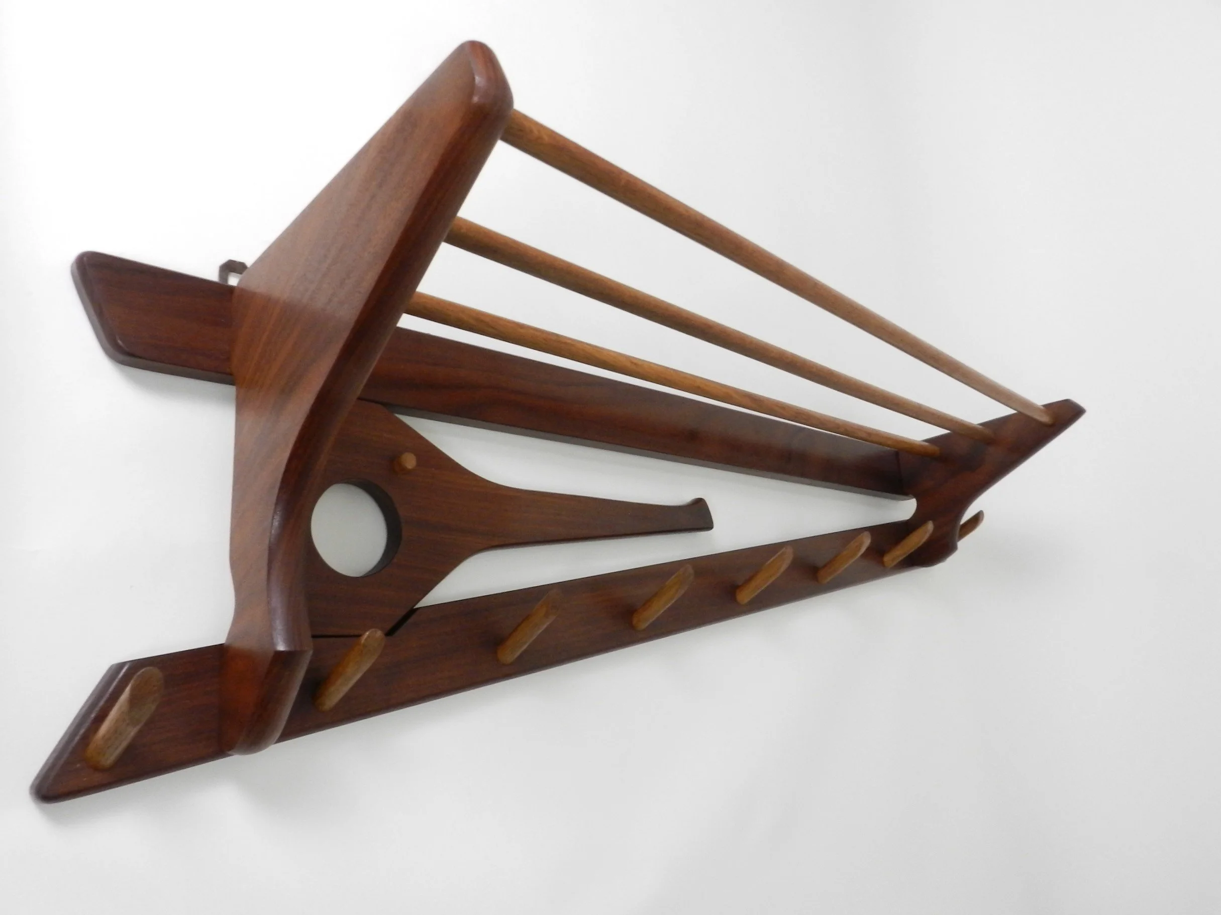 Vintage teak and oak wall mounted coat rack with swing out arm by Electrimeufa.  Netherlands, 1960s.