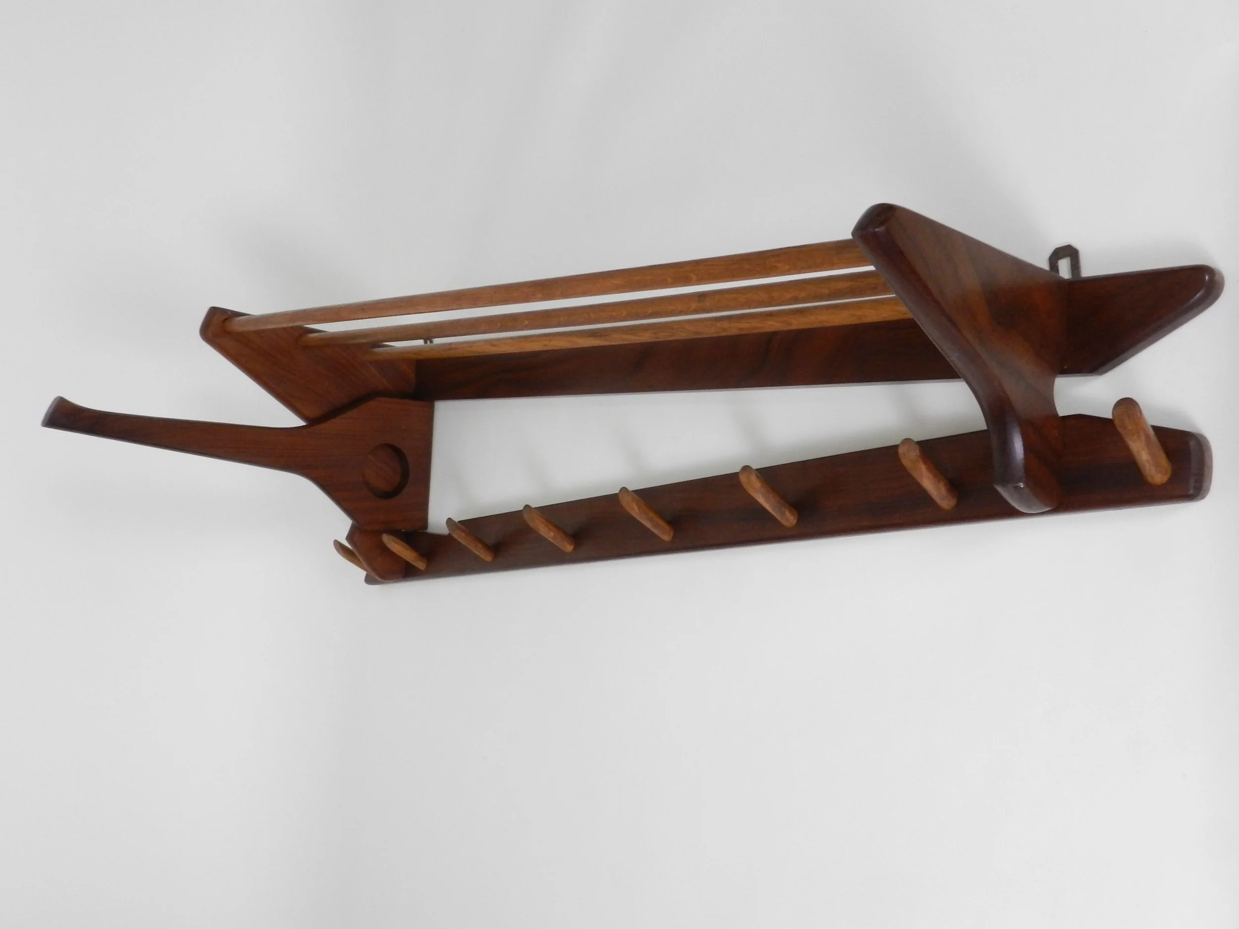 Vintage teak and oak wall mounted coat rack with swing out arm by Electrimeufa.  Netherlands, 1960s.