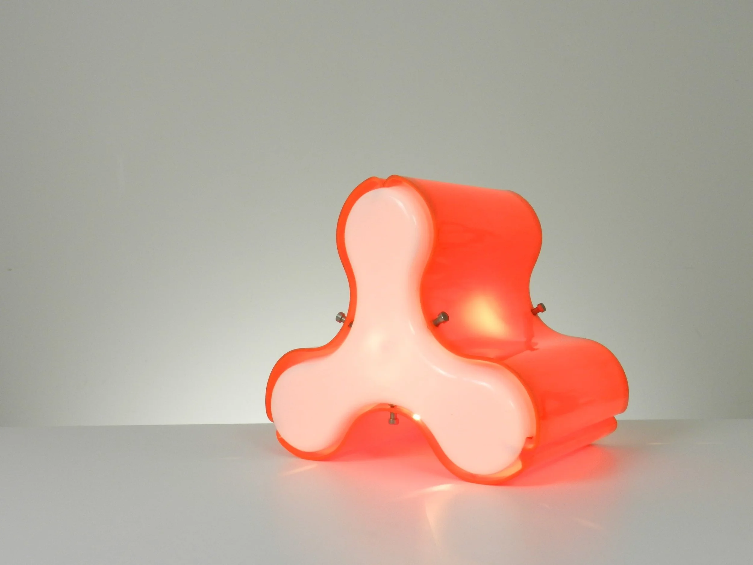 Space age sculptural orange and white acrylic lamp, designer unknown.  Canada, 1970s.