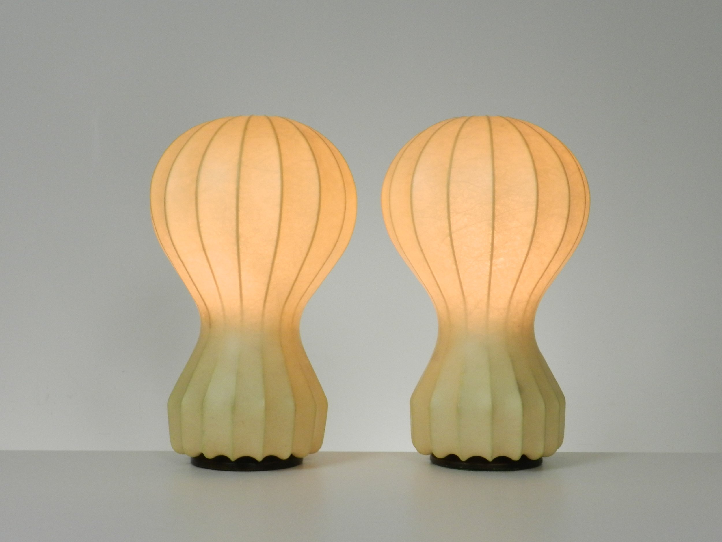 Pair of Gatto Piccolo lamps designed by Achille and Pier Giacomo Castiglioni for Flos.  Italy, 1960s.