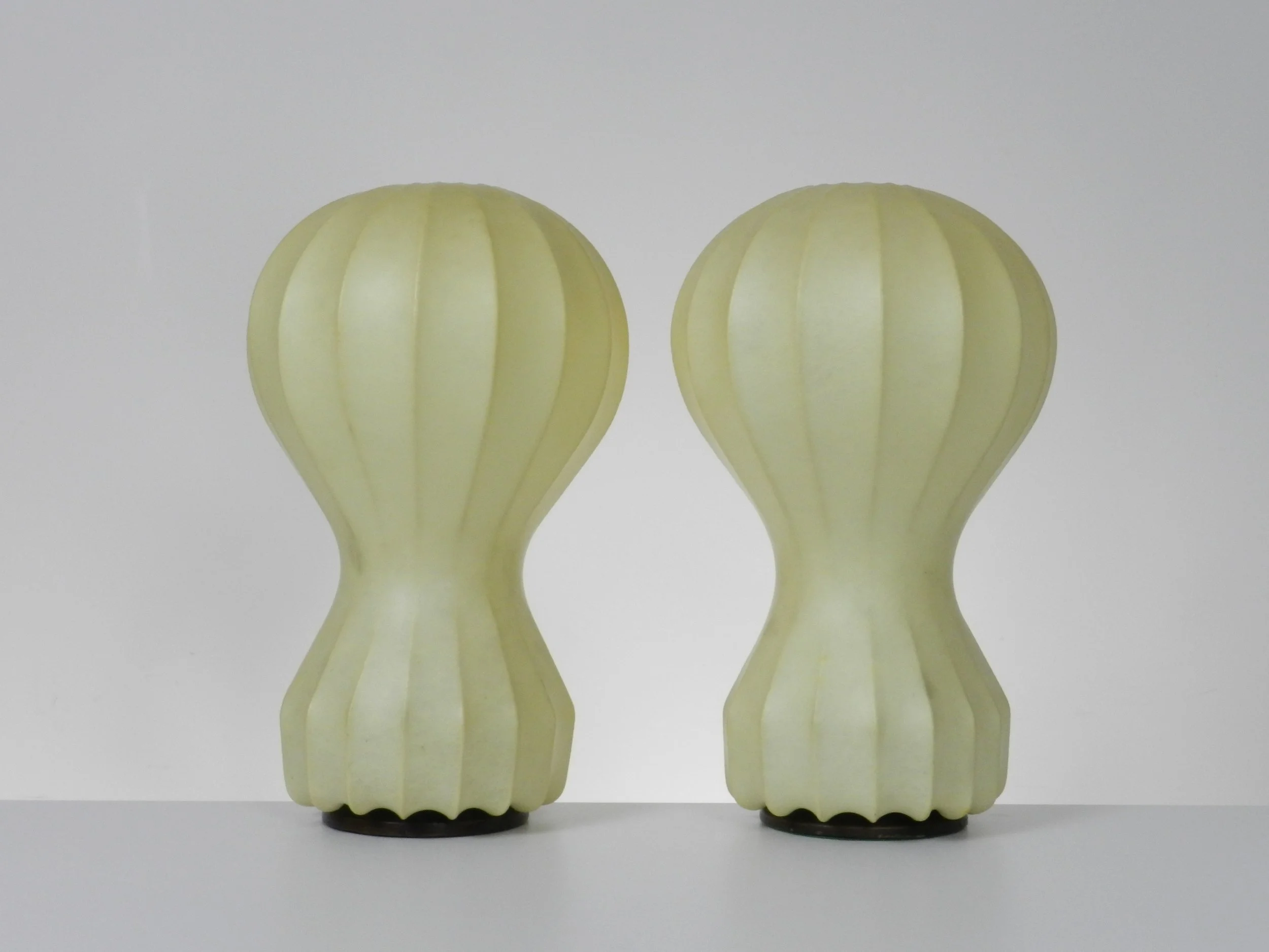 Pair of Gatto Piccolo lamps designed by Achille and Pier Giacomo Castiglioni for Flos.  Italy, 1960s.