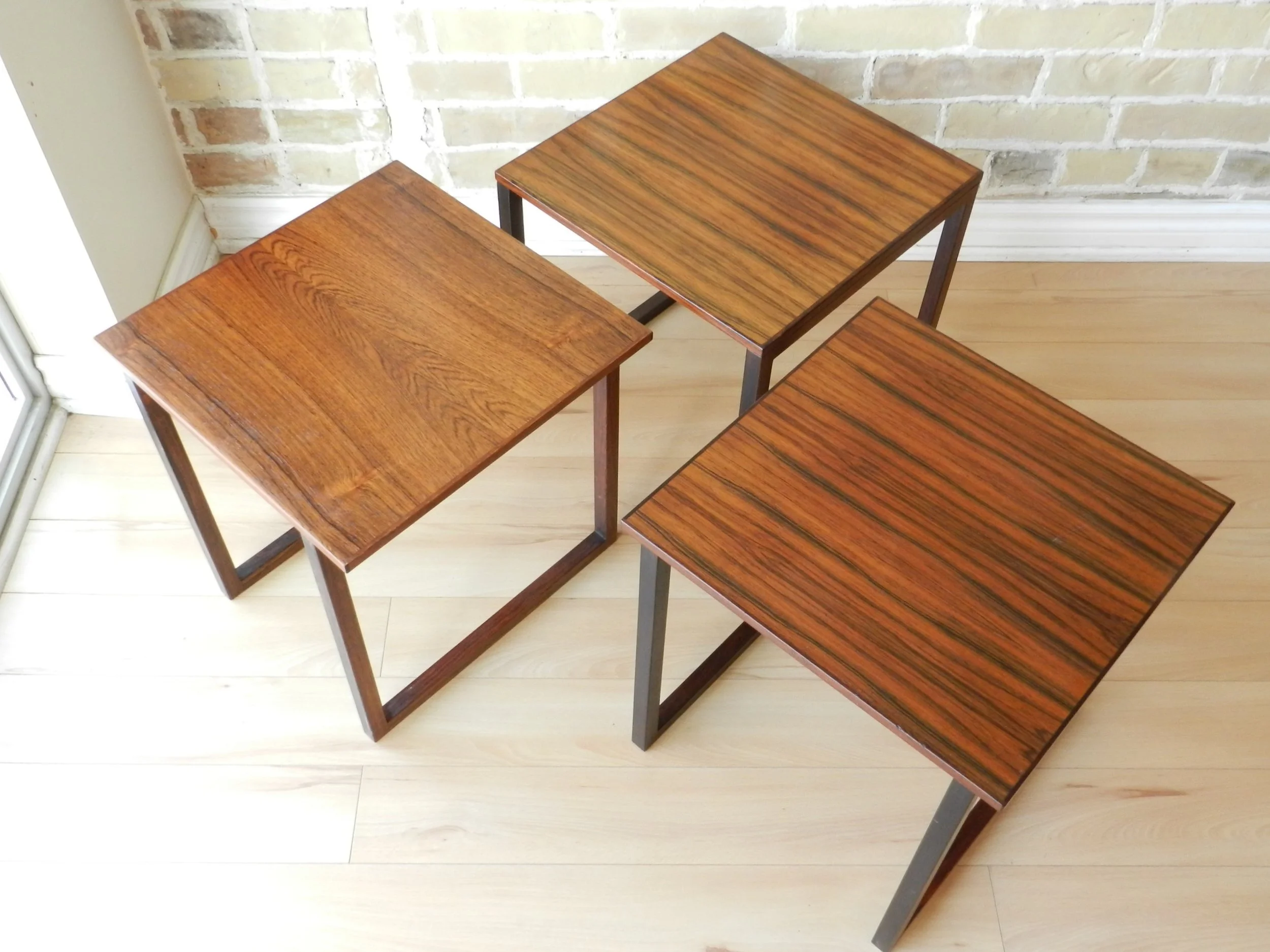 Cube rosewood nesting tables designed by Kai Kristiansen.  Denmark, 1960s.