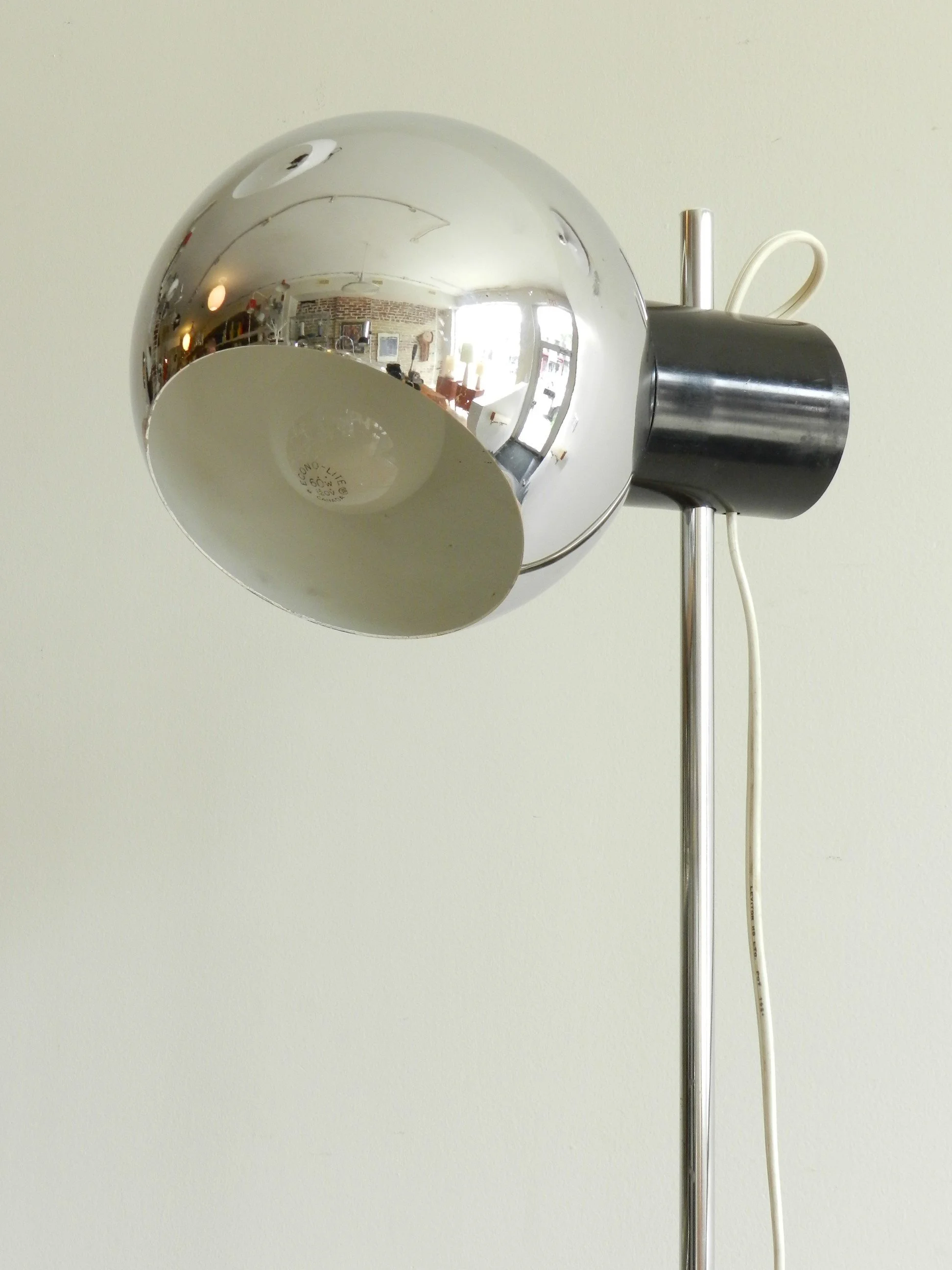 Chrome floor lamp with magnetic adjustament by Goffredo Reggiani.  Italy, 1960s.
