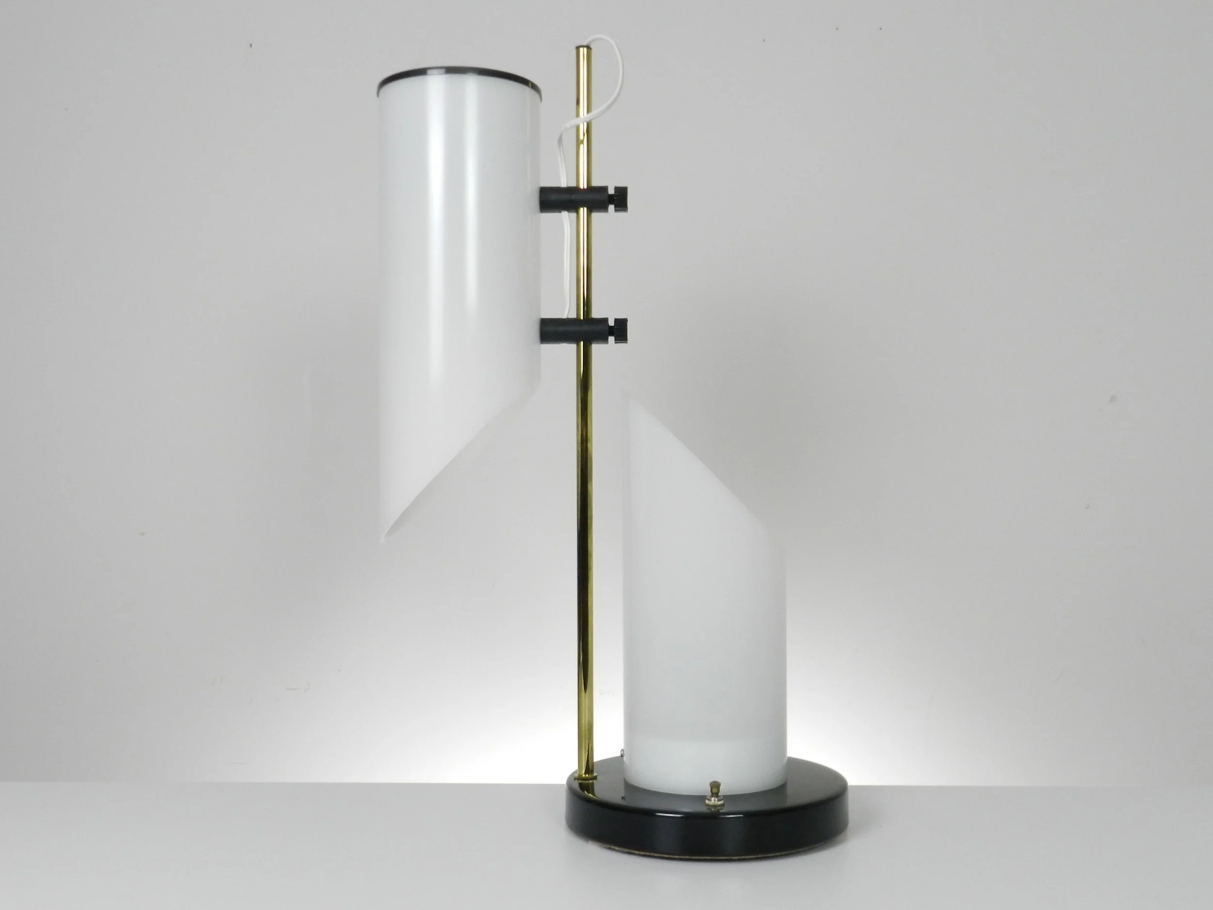 Vintage modern lamp in acrylic, brass and enameled metal.  circa 1970s.