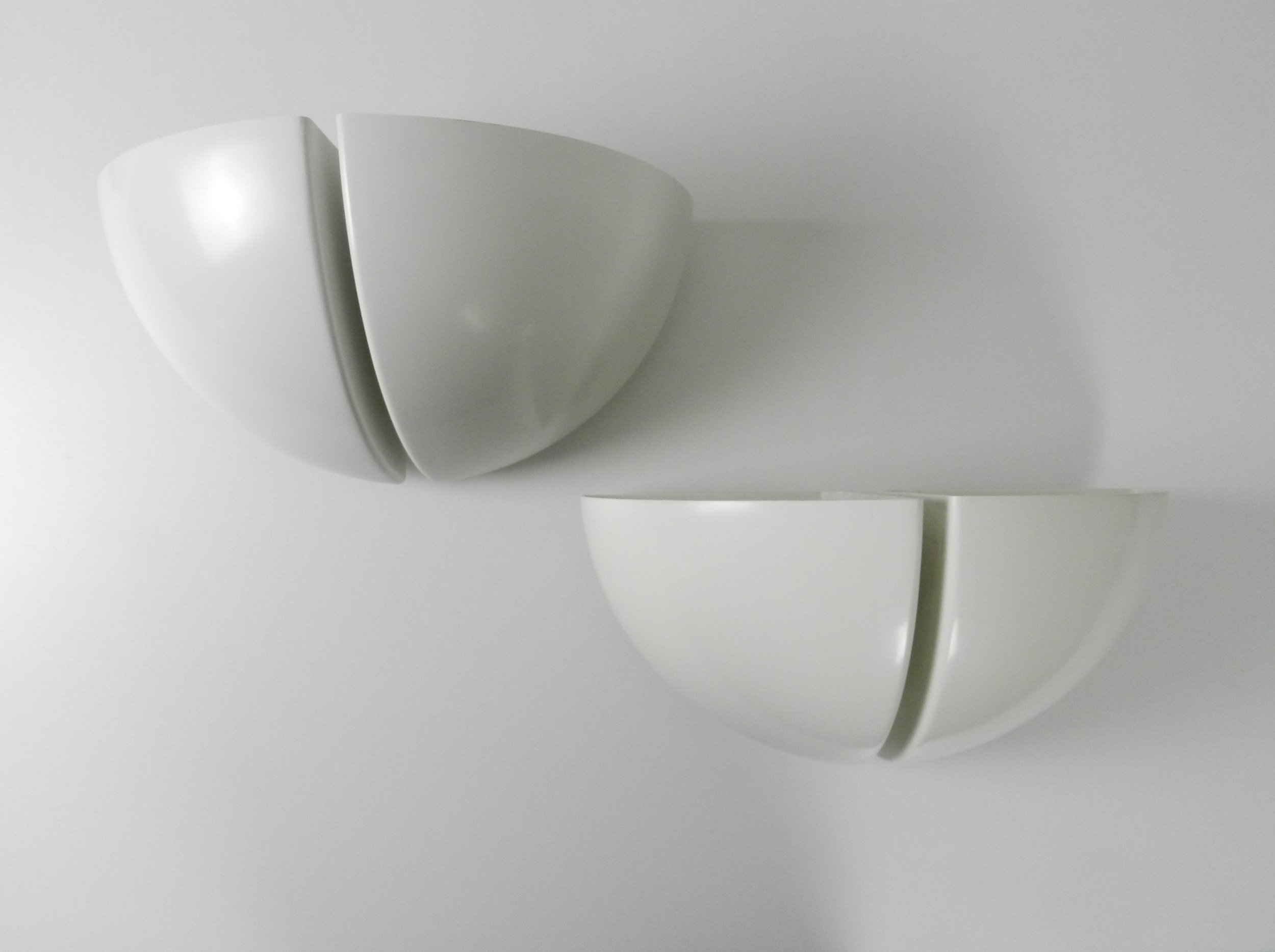 Pair of ‘Octavo’ wall lamps or sconces in plastic by Raak.  Netherlands, 1970s.