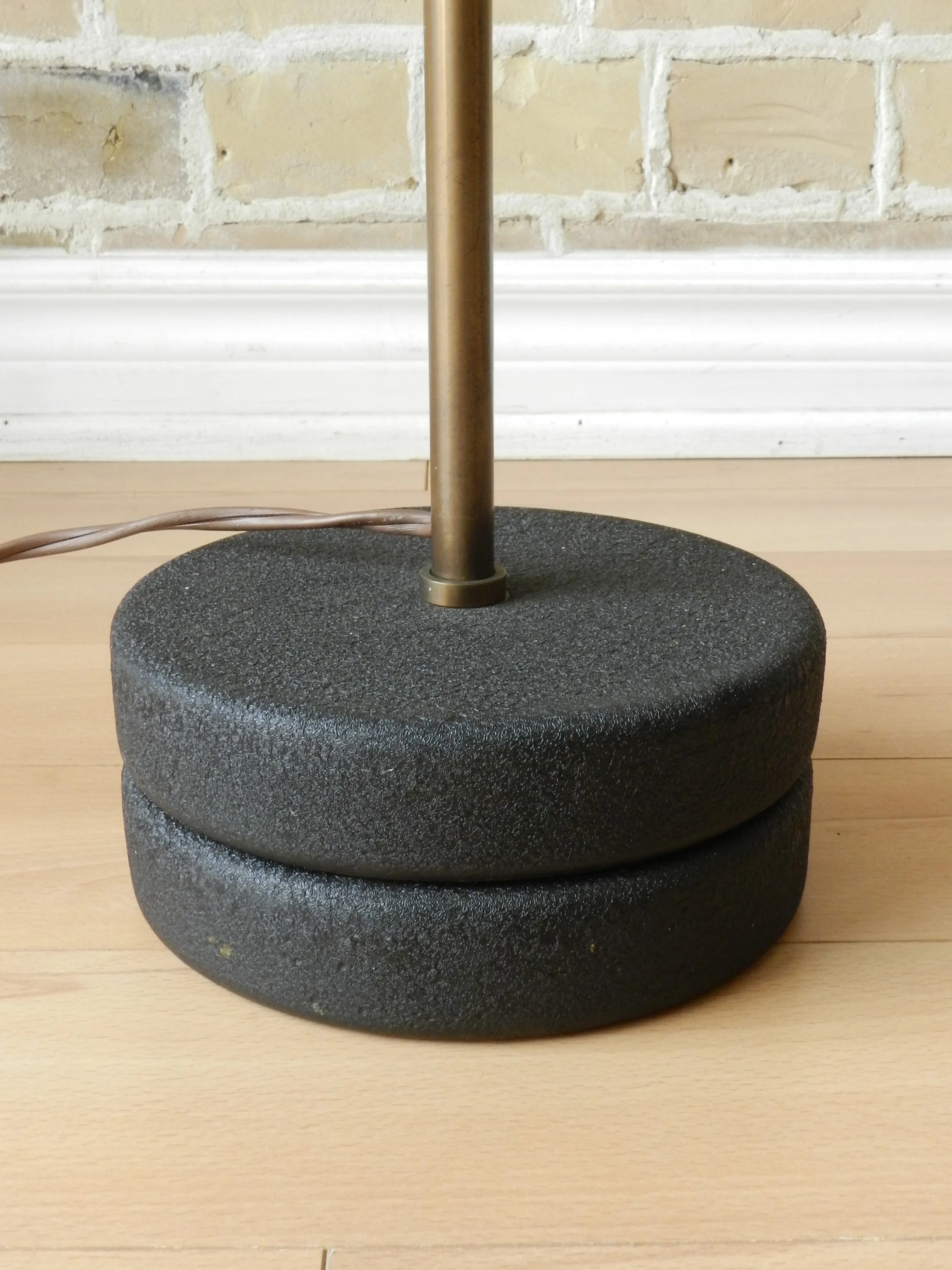 Modernist floor lamp in bronze plated arm, cast iron base and anodized aluminum shade. Designed by Robert Sonneman.  USA, 1960s.