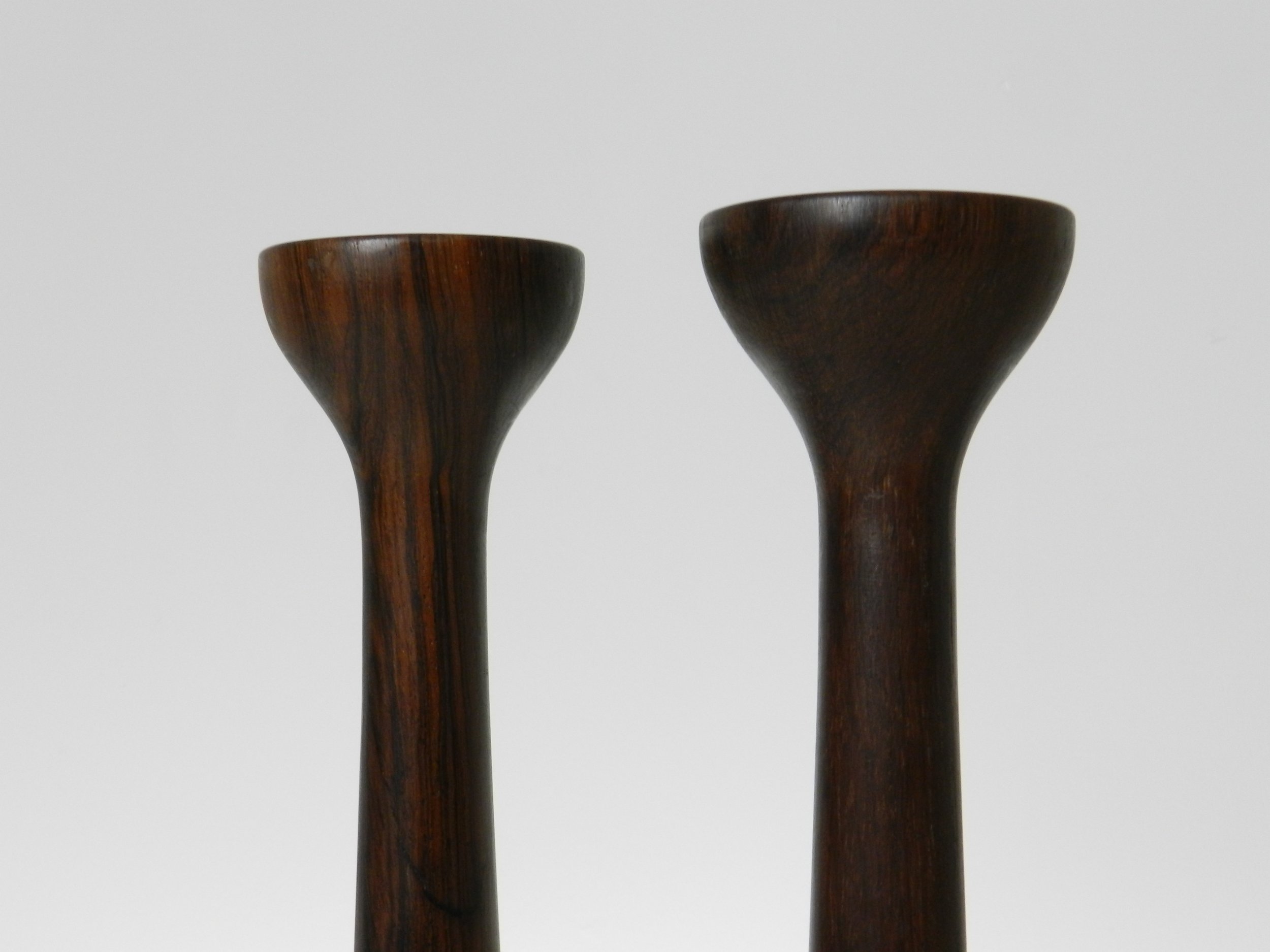 Pair of tall rosewood candle holders by H+F.  Denmark, 1960s.