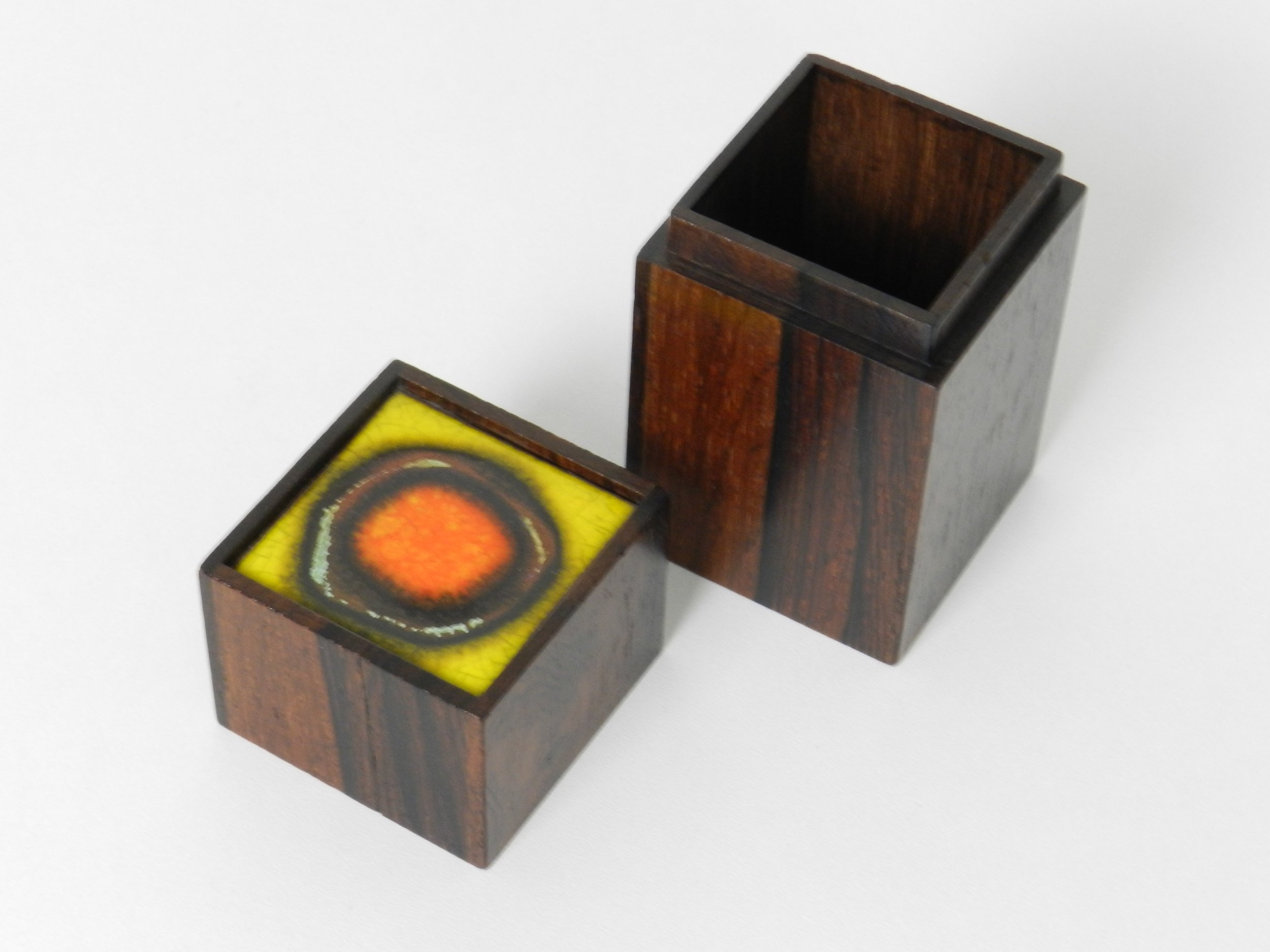 Rosewood box with enameled lid designed by Alfred Klitgaard.  Denmark, 1950s.