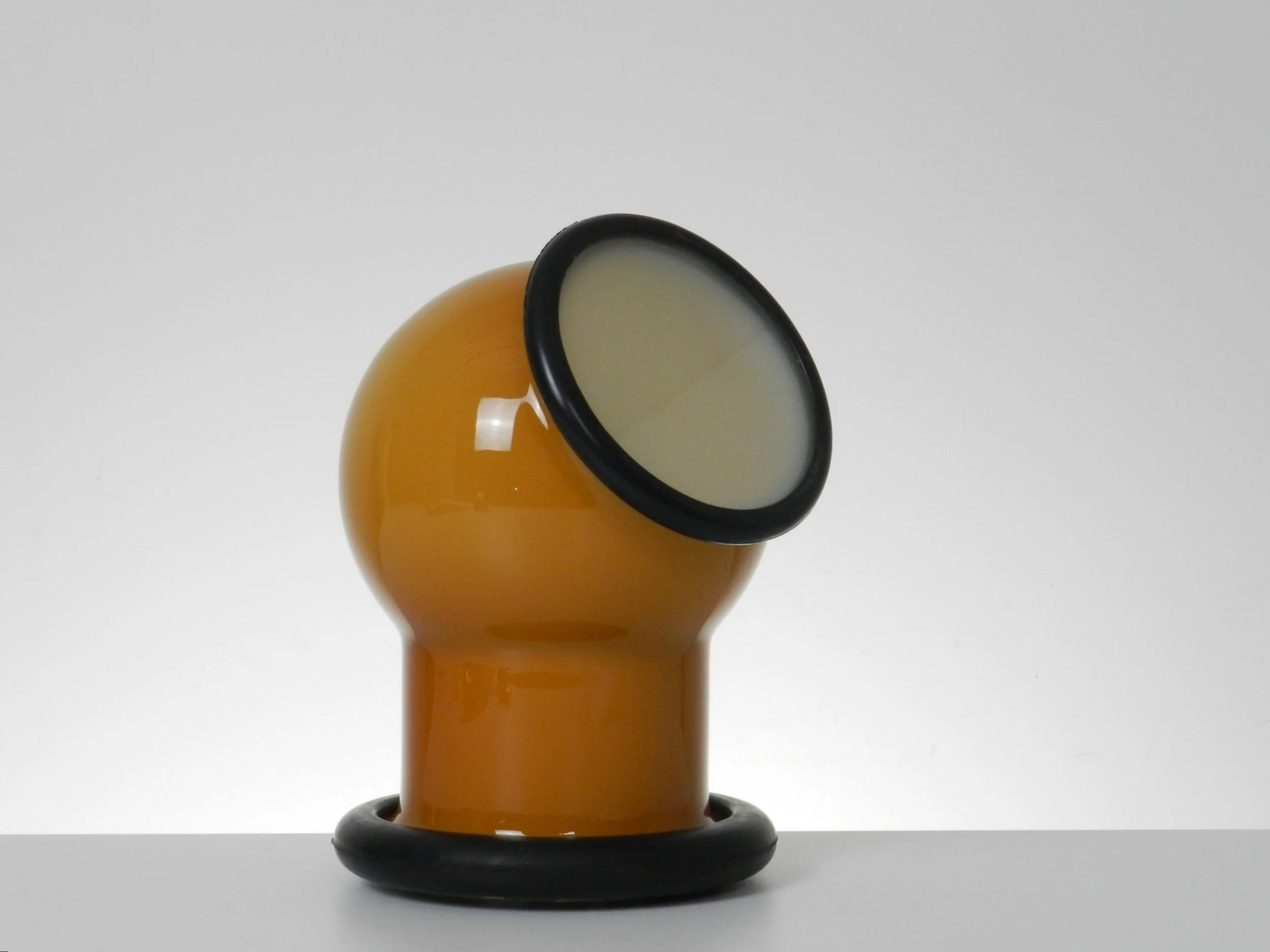 Cased glass and rubber lamp designed by Michael Bang for Holmegaard.  Denmark, 1970s.