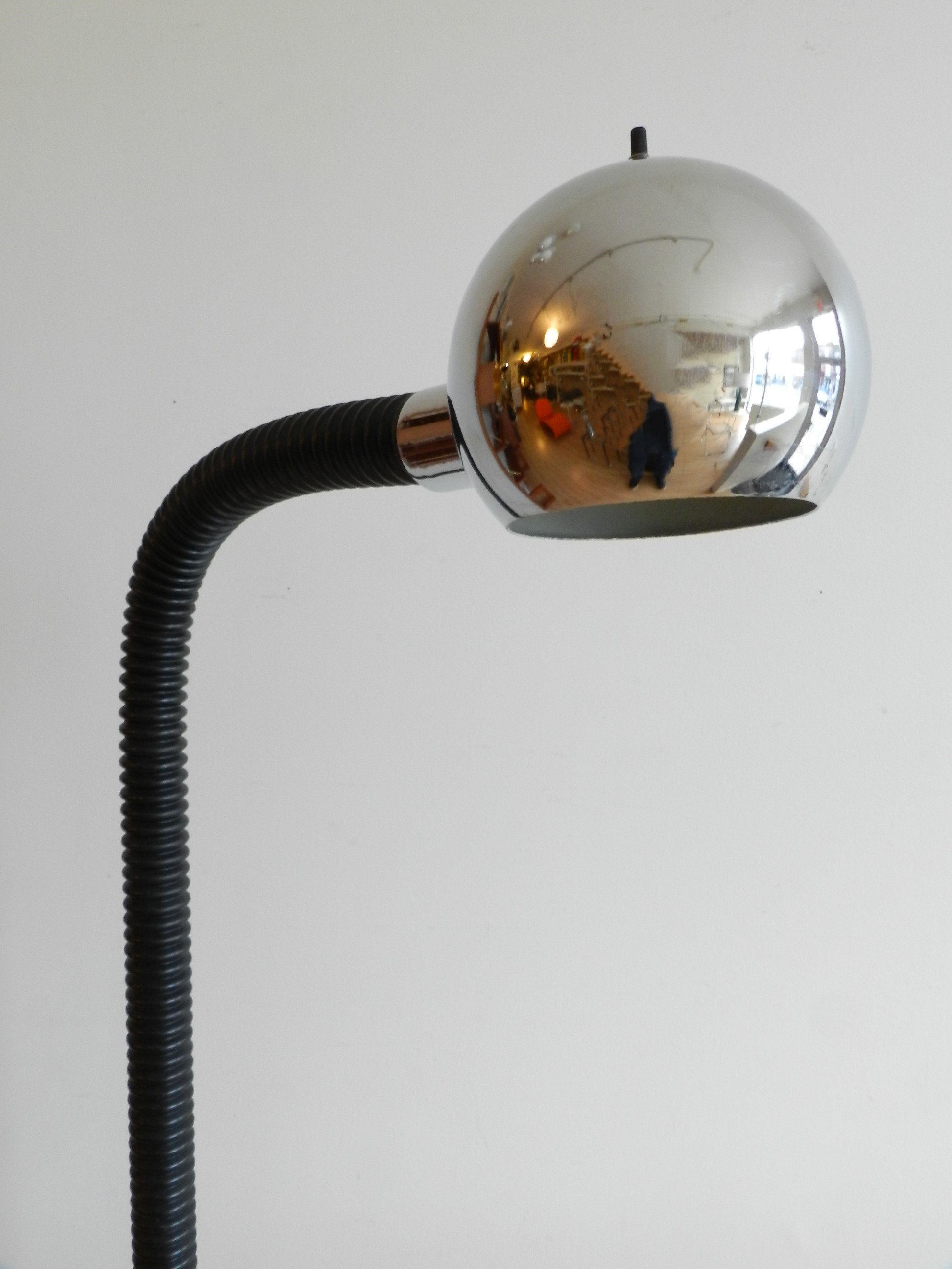 Space age floor lamp in chrome and flexible plastic.  circa 1970s.