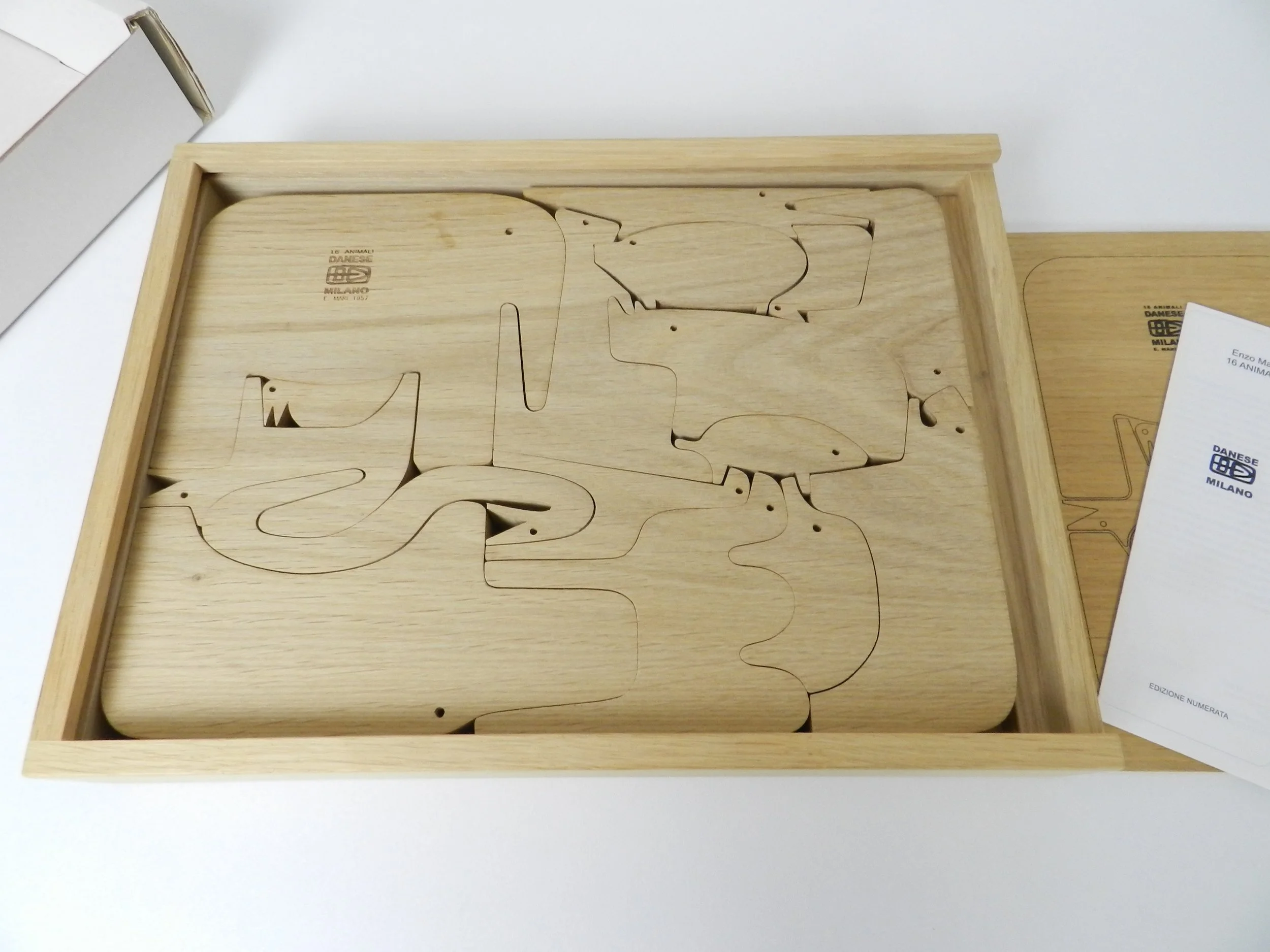 16 animal oak puzzle designed by Enzo Mari. designed in 1957, thos is a more recent production with original wood case and box.