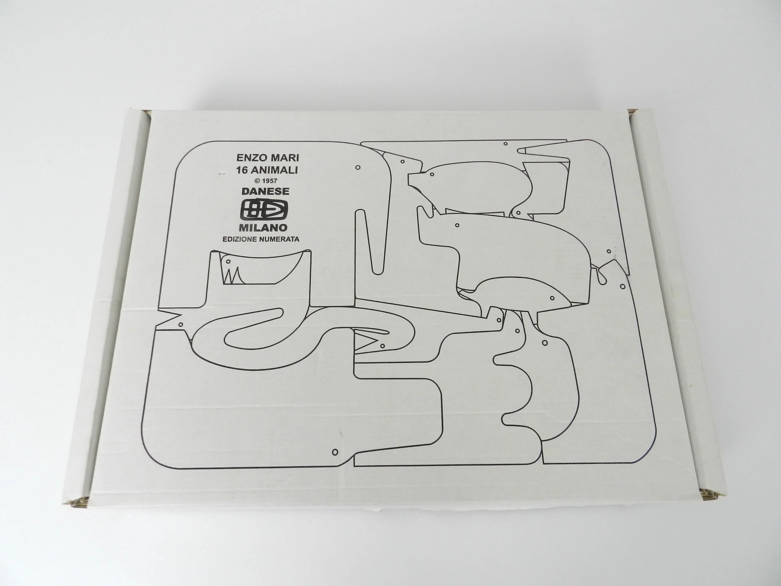 16 animal oak puzzle designed by Enzo Mari. designed in 1957, thos is a more recent production with original wood case and box.
