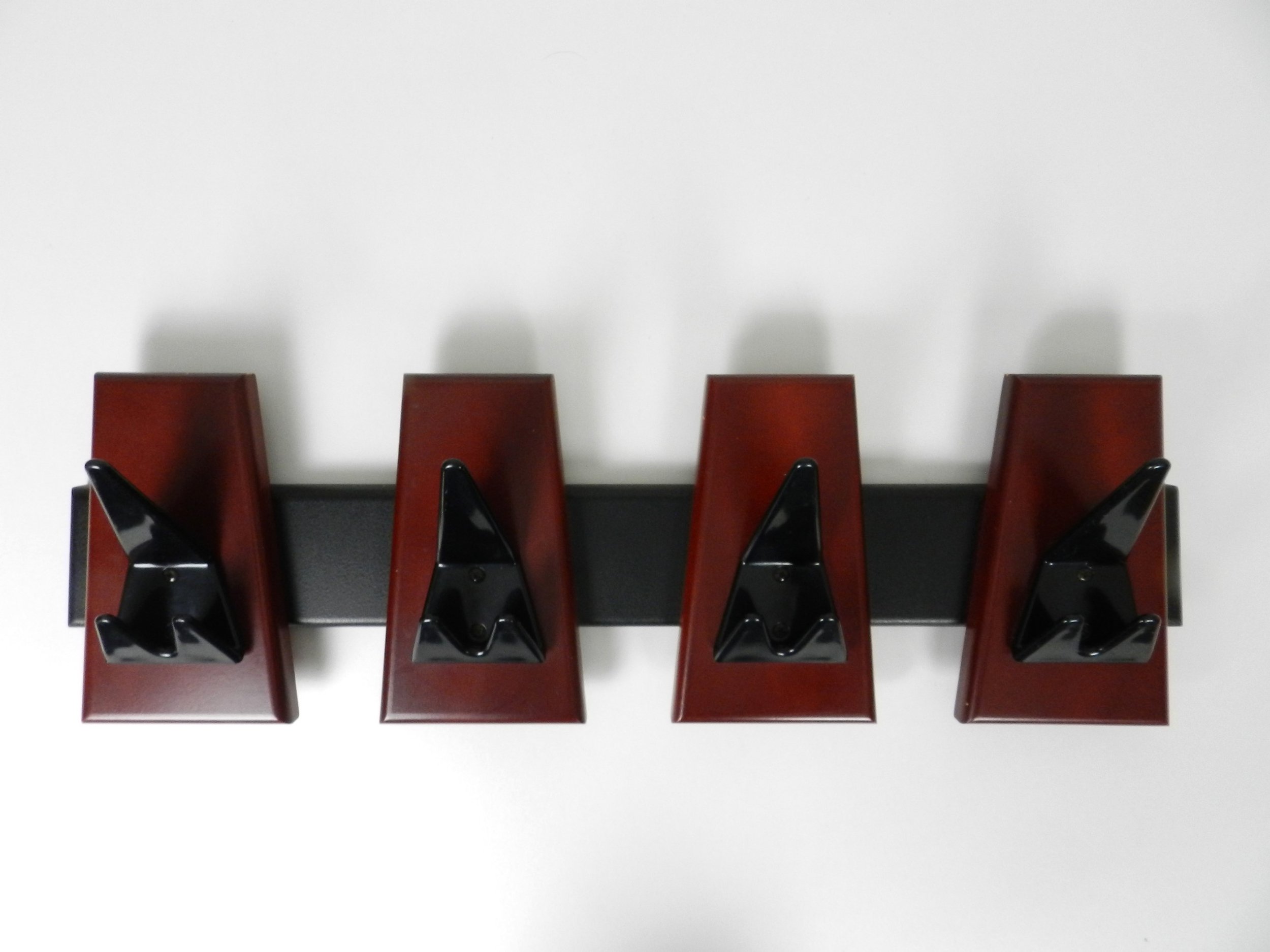 Modernist coat rack in wood and enameled metal.  circa 1980s.