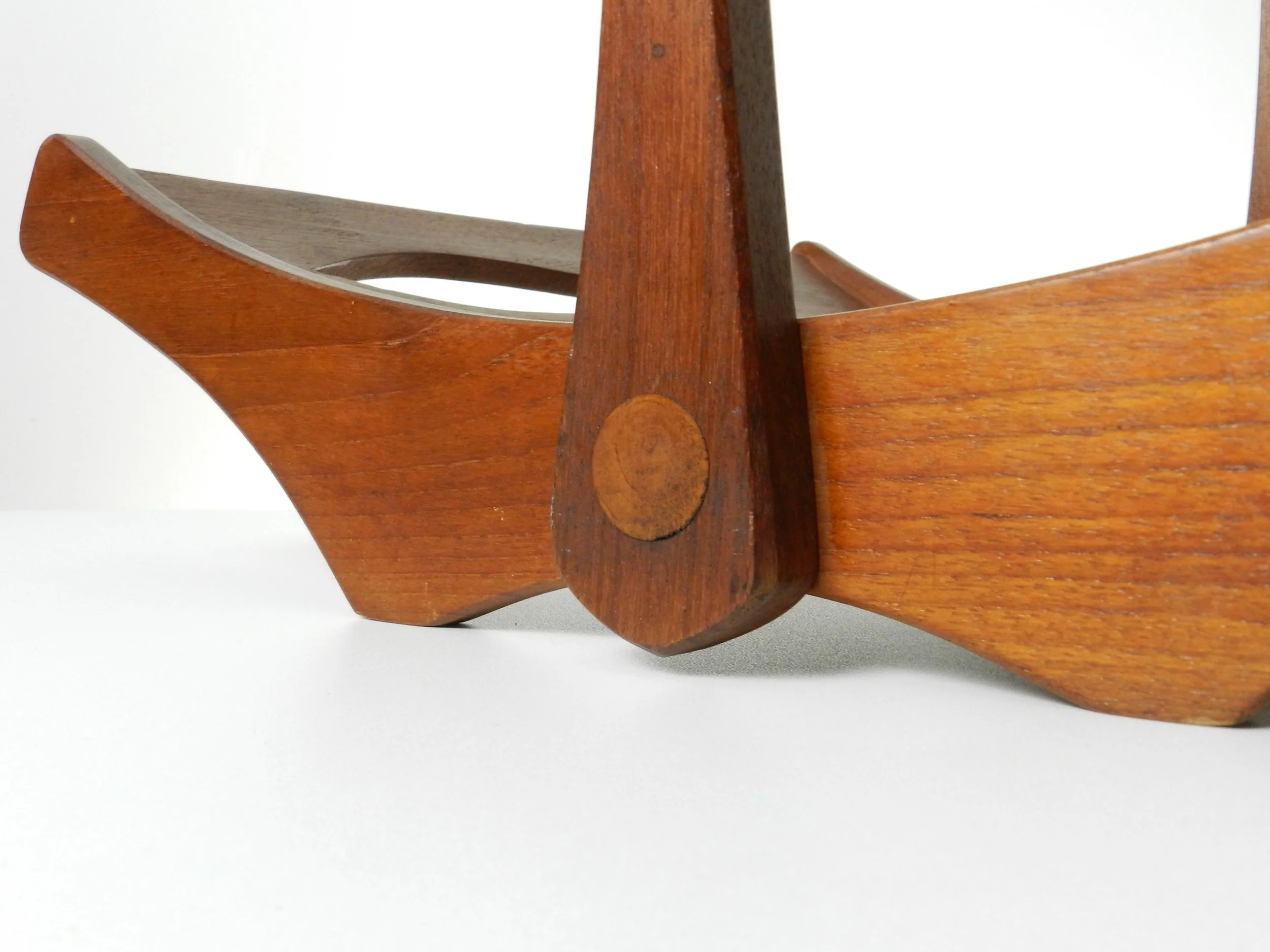Solid teak magazine rack designed by Jens Quistgaard for Dansk.  Denmark, 1960s.