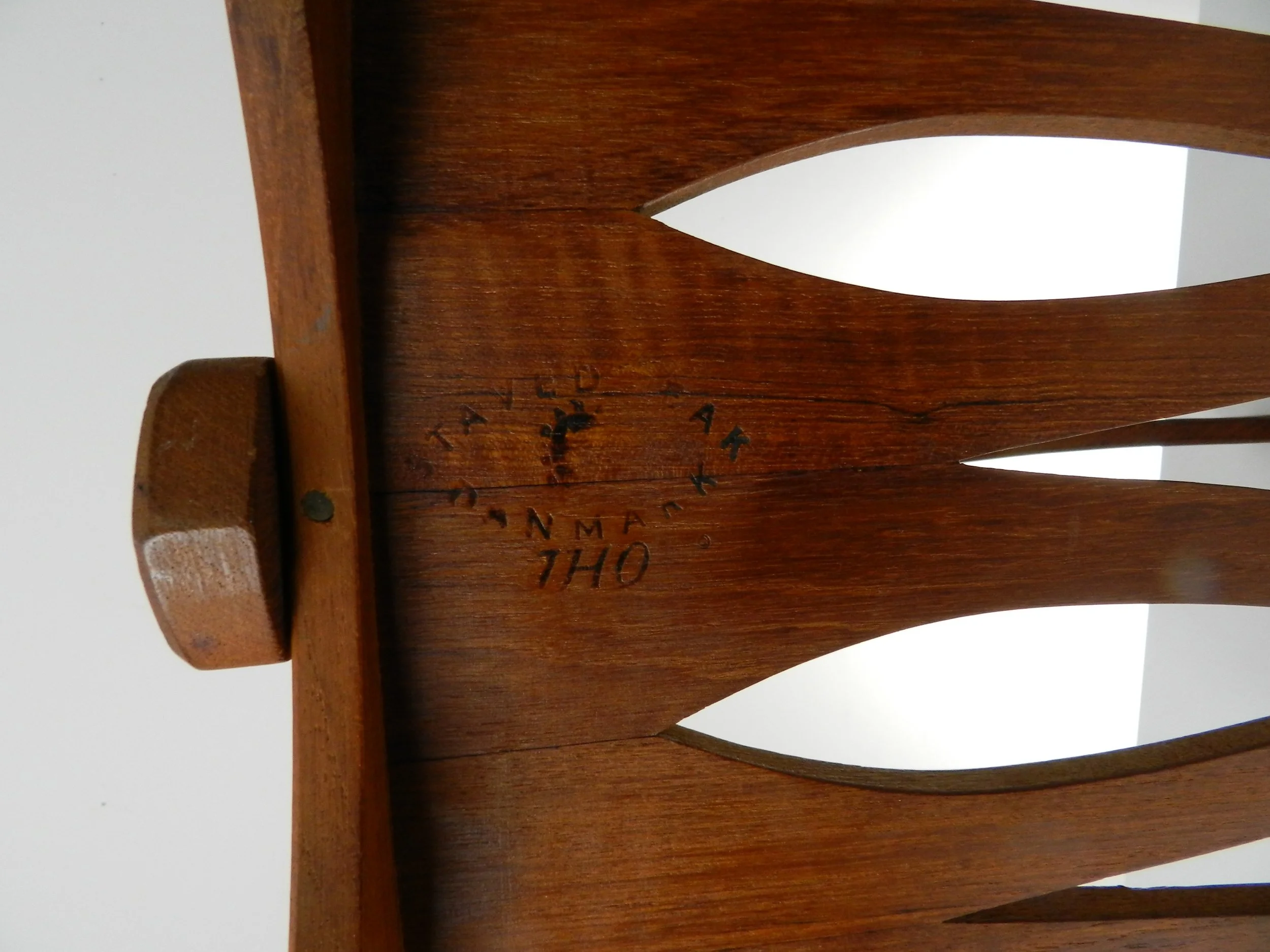 Solid teak magazine rack designed by Jens Quistgaard for Dansk.  Denmark, 1960s.