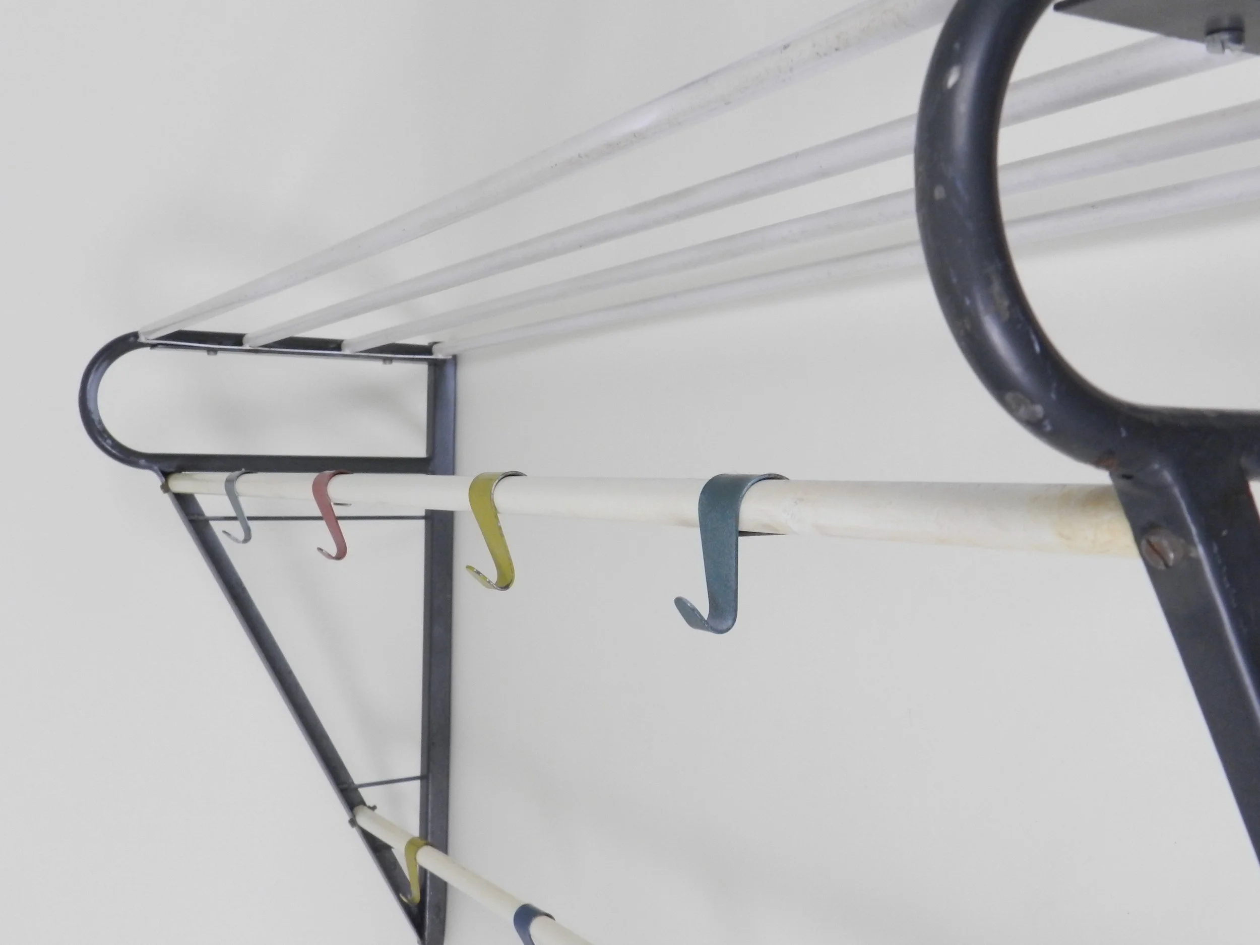 Mid century vintage enameled metal coat rack designed by Coen de Vries for Devo.  Netherlands, 1950s