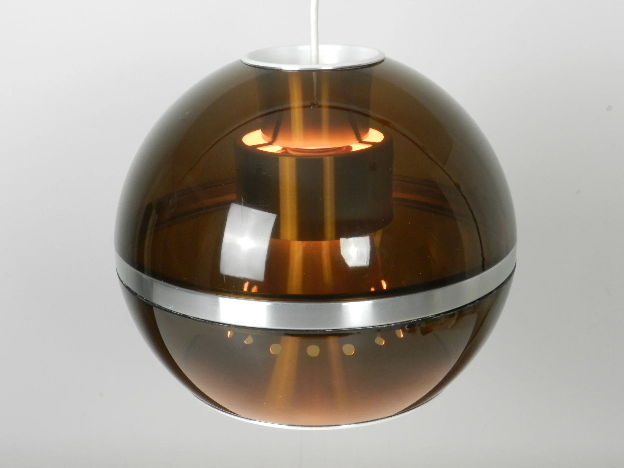 Space age pendant lamp by Dijkstra in tinted acrylic and aluminum.  Netherlands, 1970s.