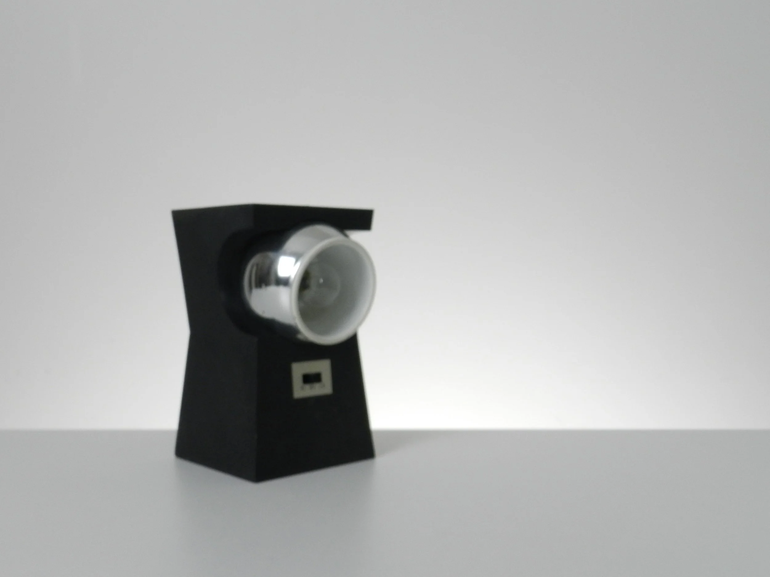 Space age eyeball lamp in plastic and chrome. Table top or wall mounted.  Japan, 1970s.