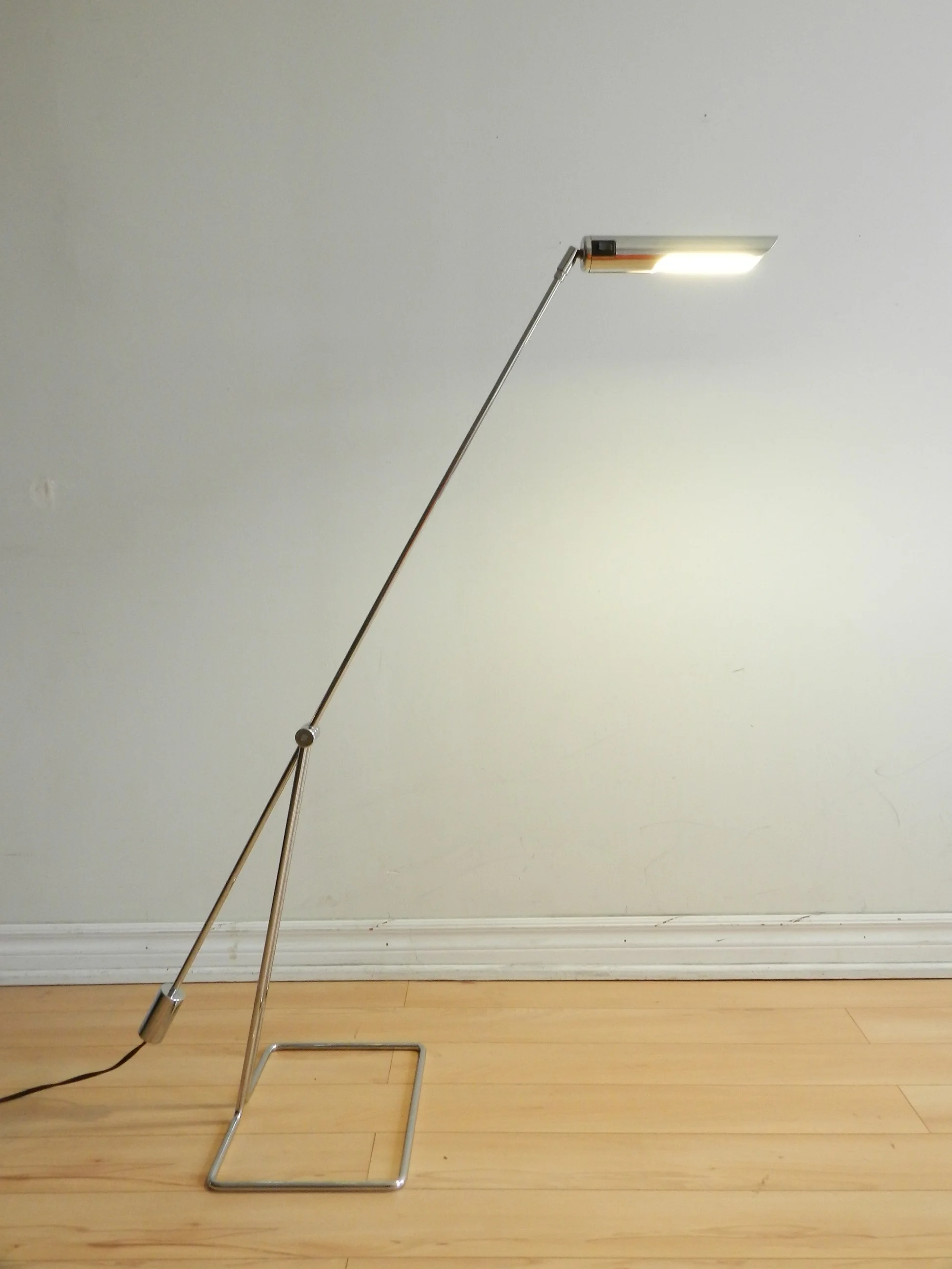 Minimalist chrome counter balance floor lamp designed by Abo Randers.  Denmark, design from the 1970s.