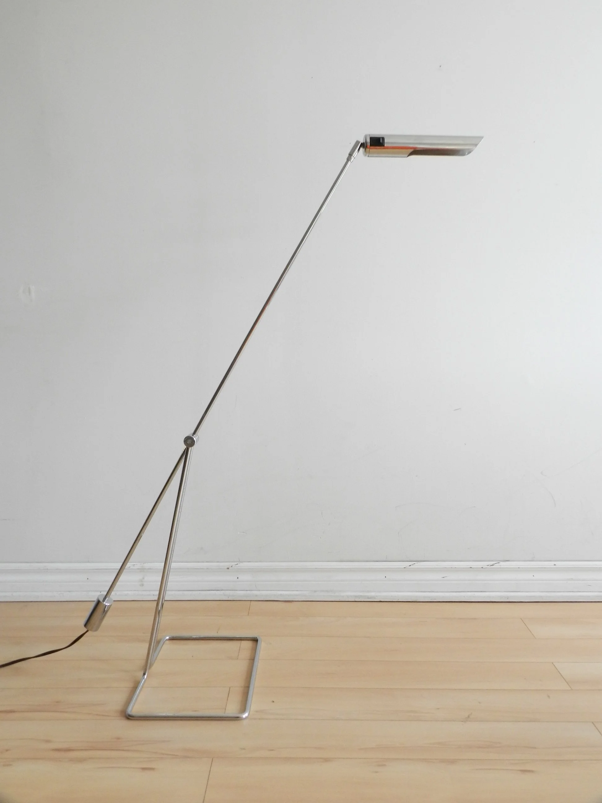 Minimalist chrome counter balance floor lamp designed by Abo Randers.  Denmark, design from the 1970s.