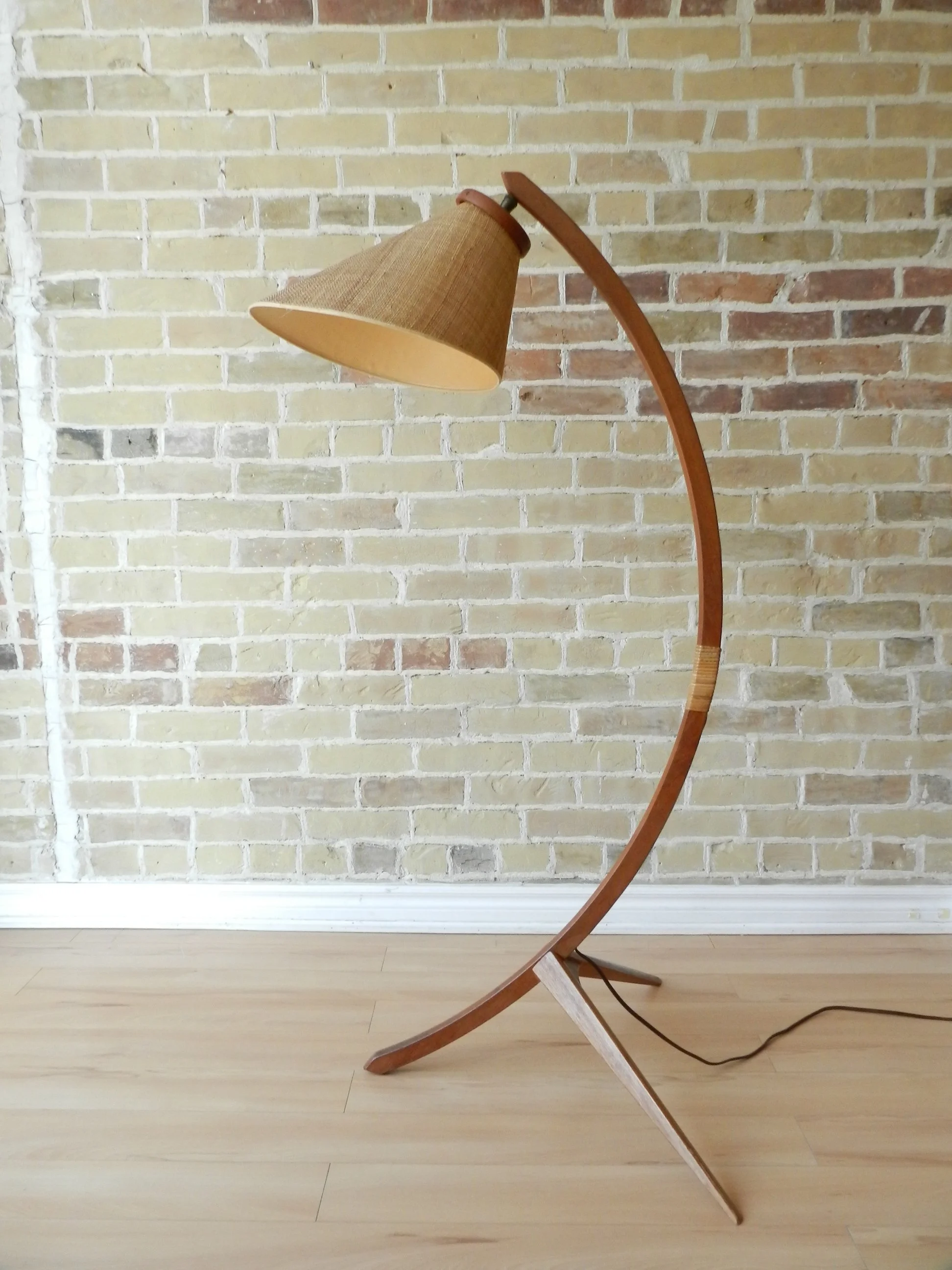 Teak arc floor lamp with original grass cloth covered shade.  Denmark, 1960s.