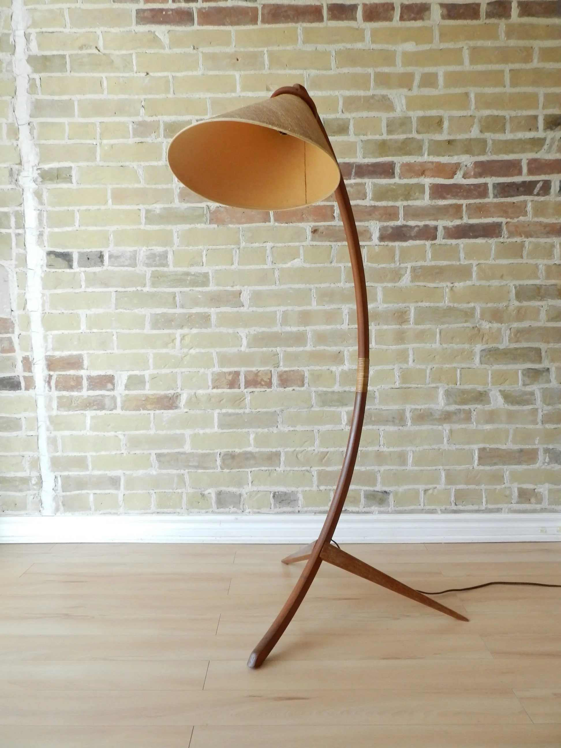 Teak arc floor lamp with original grass cloth covered shade.  Denmark, 1960s.