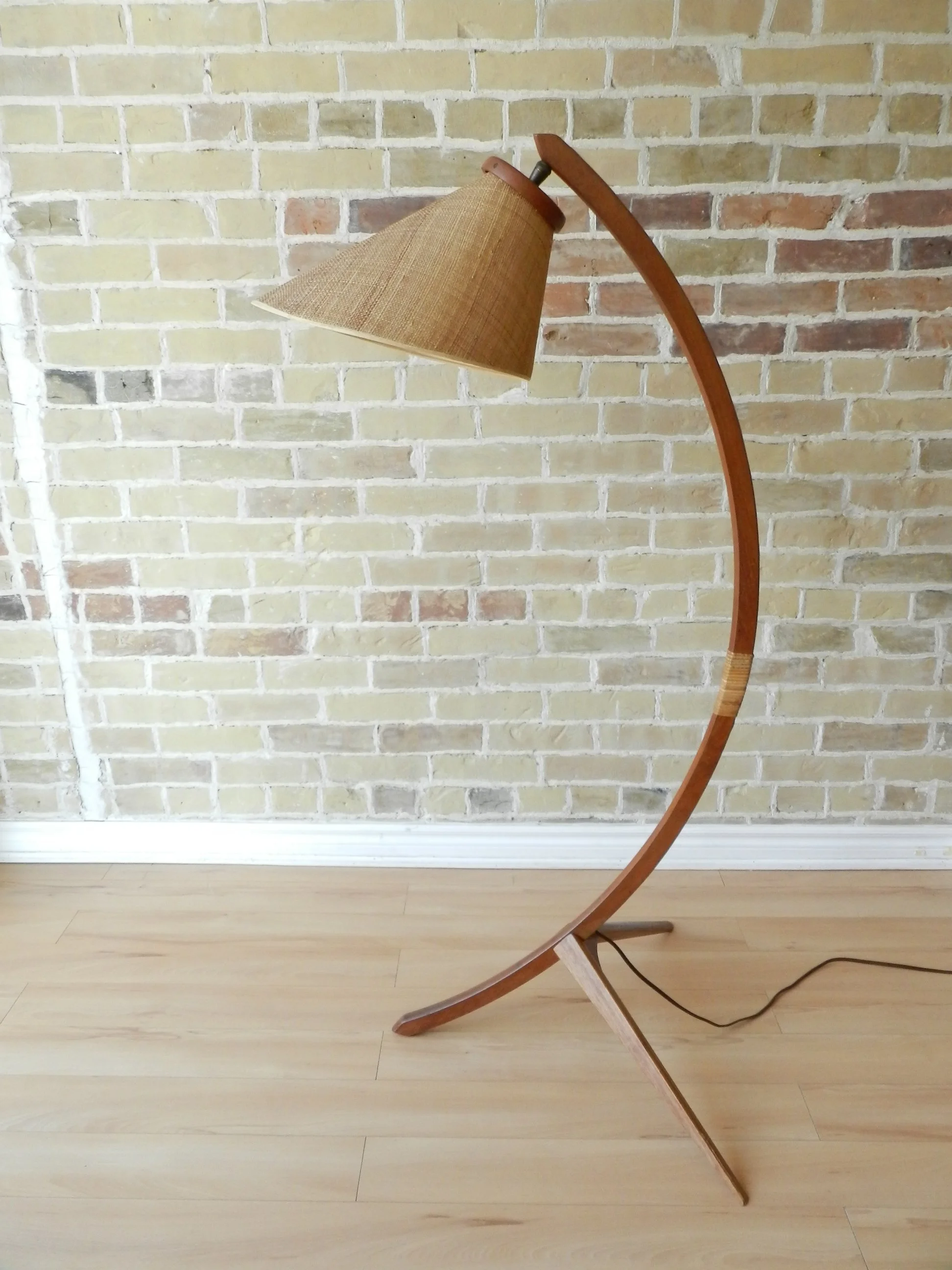 Teak arc floor lamp with original grass cloth covered shade.  Denmark, 1960s.