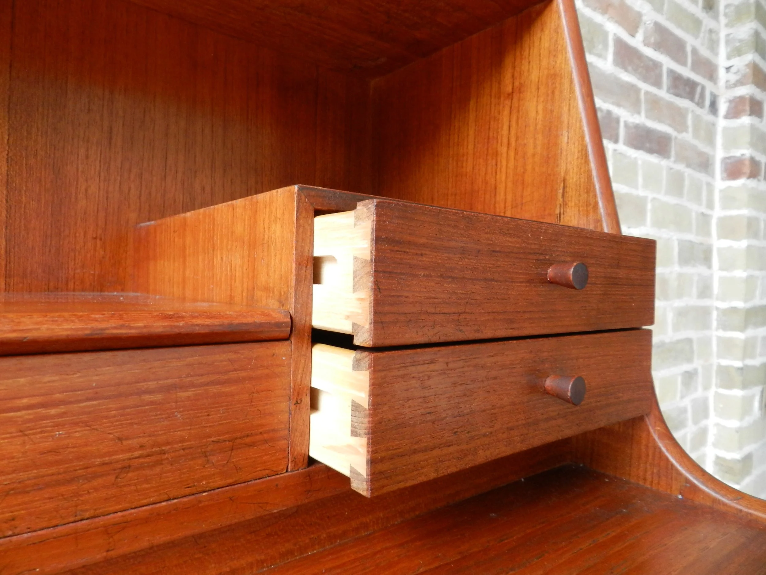 Teak secretary desk with pop up mirror retractable desk top. Designed by Arne Wahl Iversen for Vinde Mobelfabrik.  Denmark, 1960s.