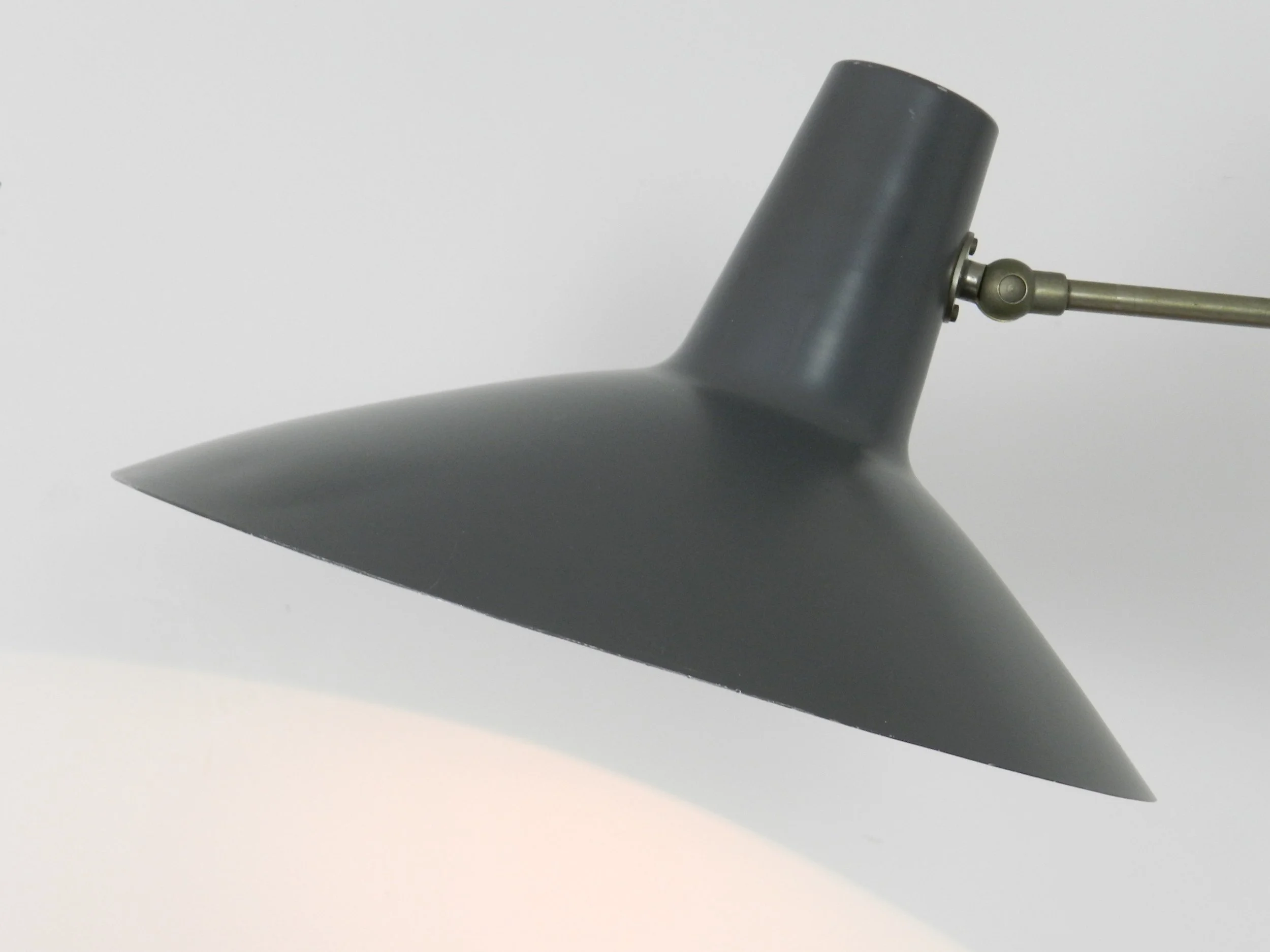 Mid century modern articulating wall lamp by Artimeta.  Netherlands, 1950s.