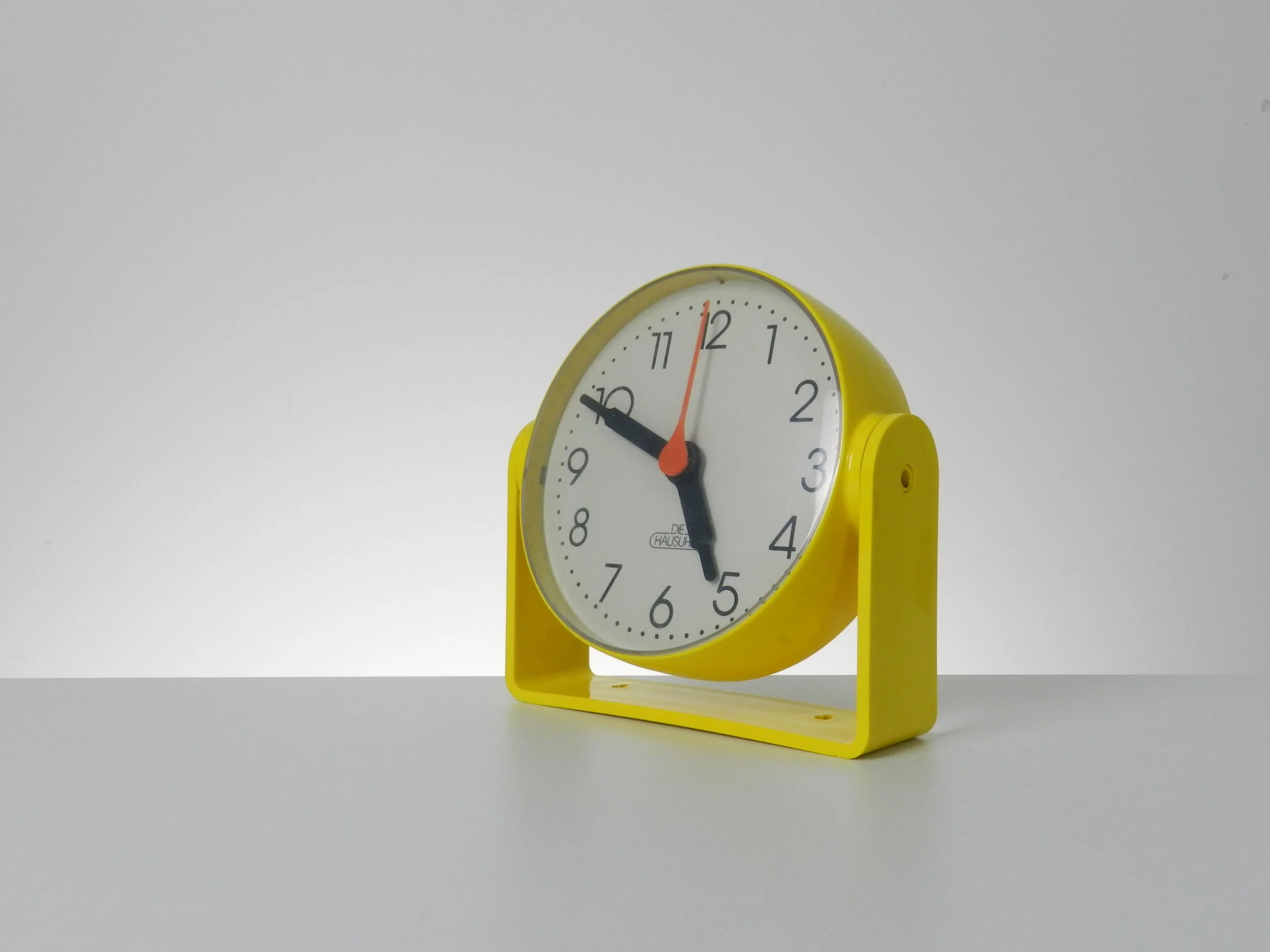 Space age clock by Die Hausuhr. Table top or wall mount.  West Germany, 1970s.