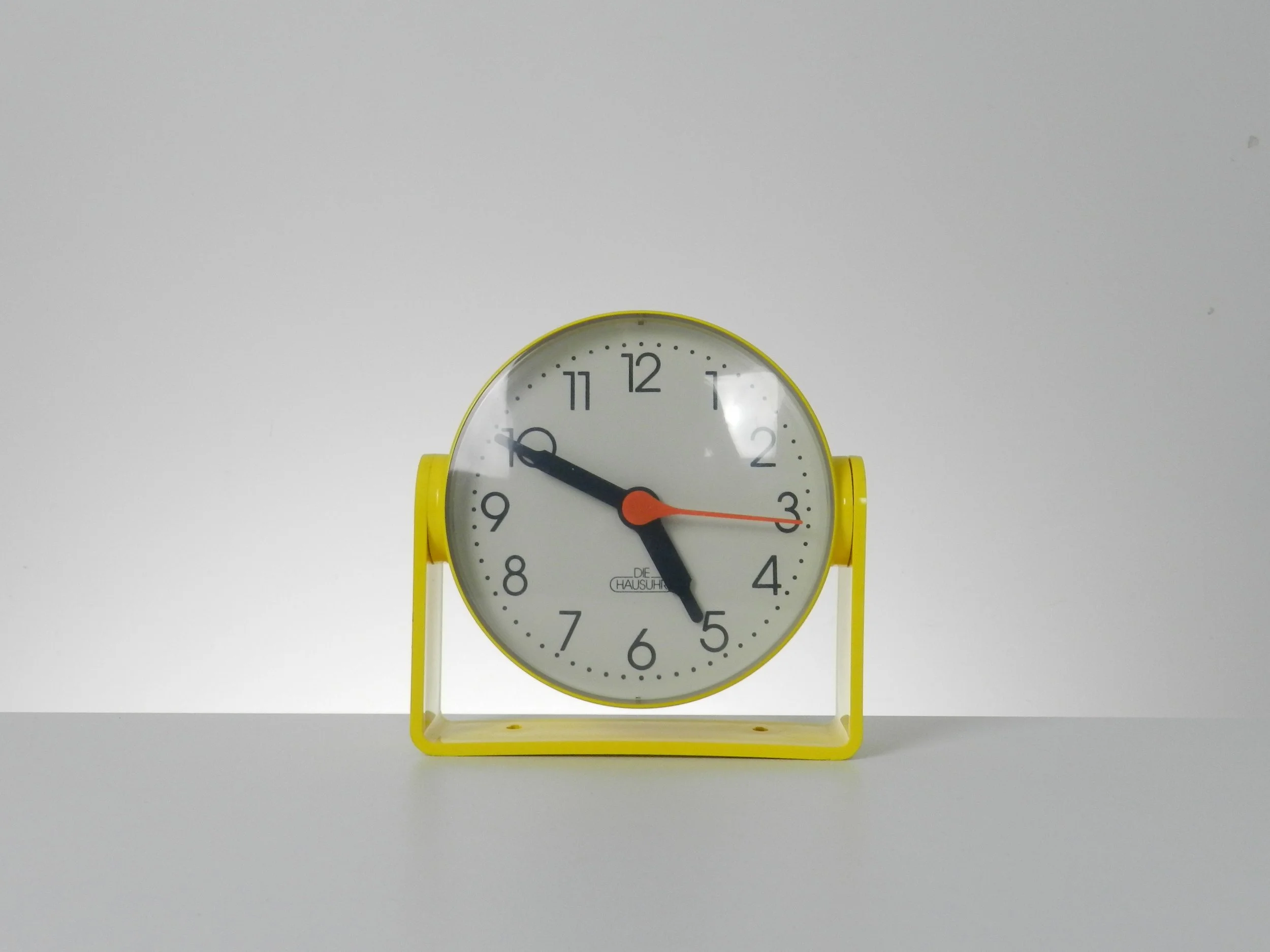 Space age clock by Die Hausuhr. Table top or wall mount.  West Germany, 1970s.