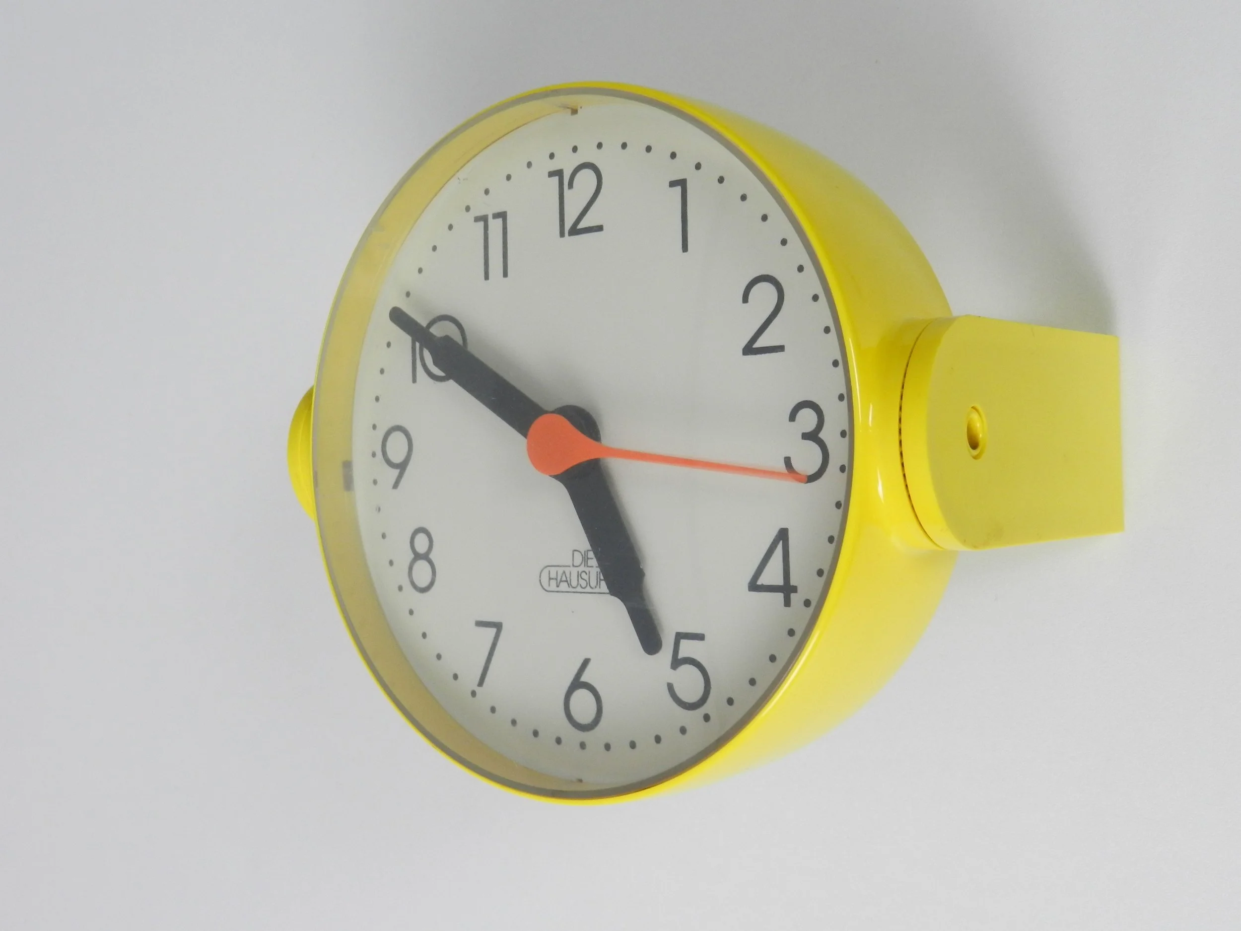 Space age clock by Die Hausuhr. Table top or wall mount.  West Germany, 1970s.