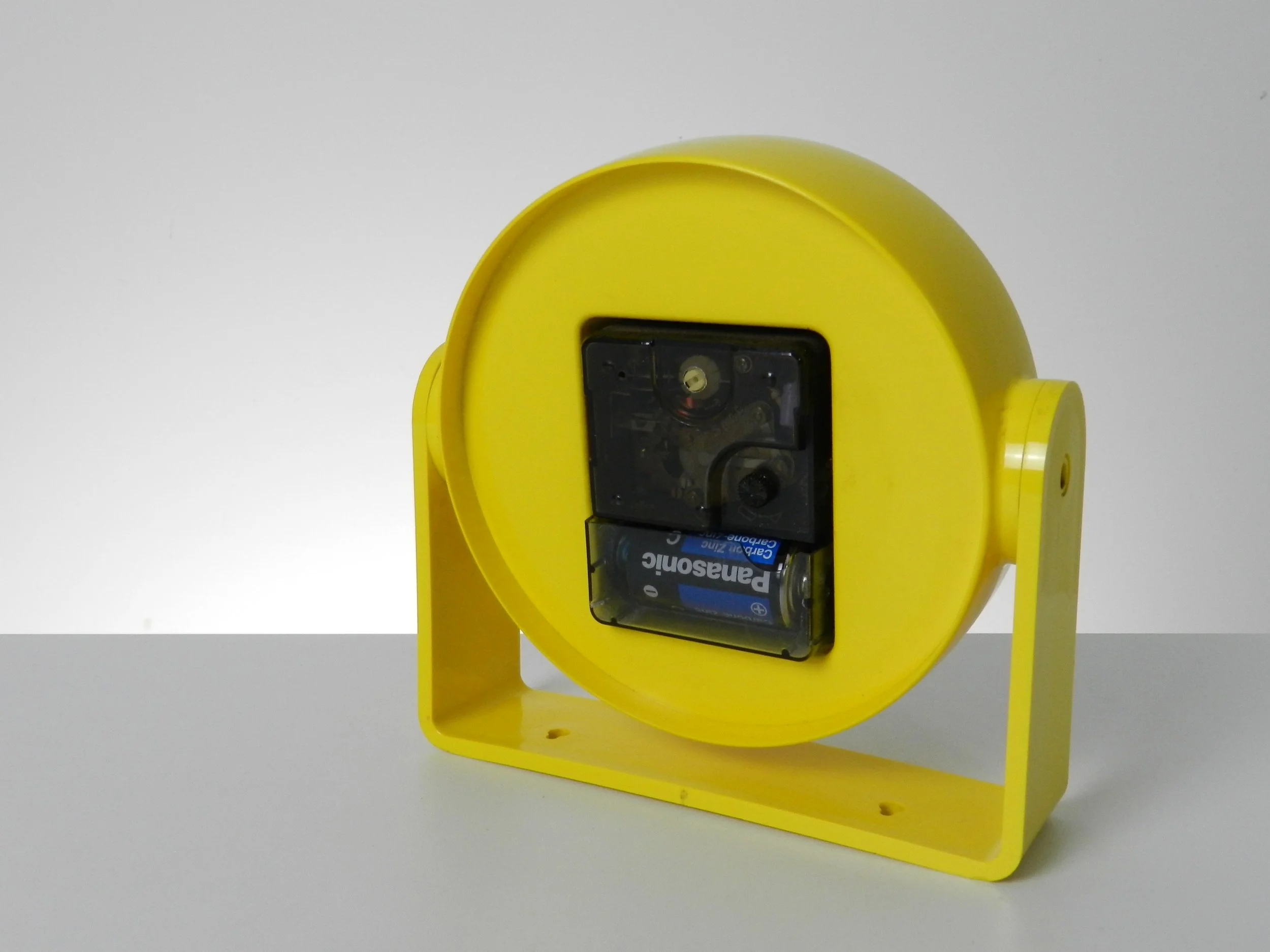 Space age clock by Die Hausuhr. Table top or wall mount.  West Germany, 1970s.