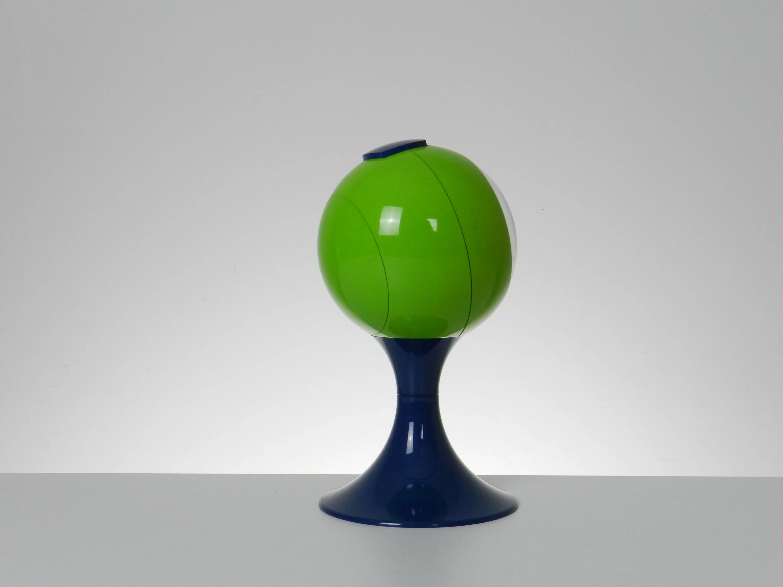 Space age pedestal clock in blue and green colored plastic by Blessing.  West Germany, 1970s.