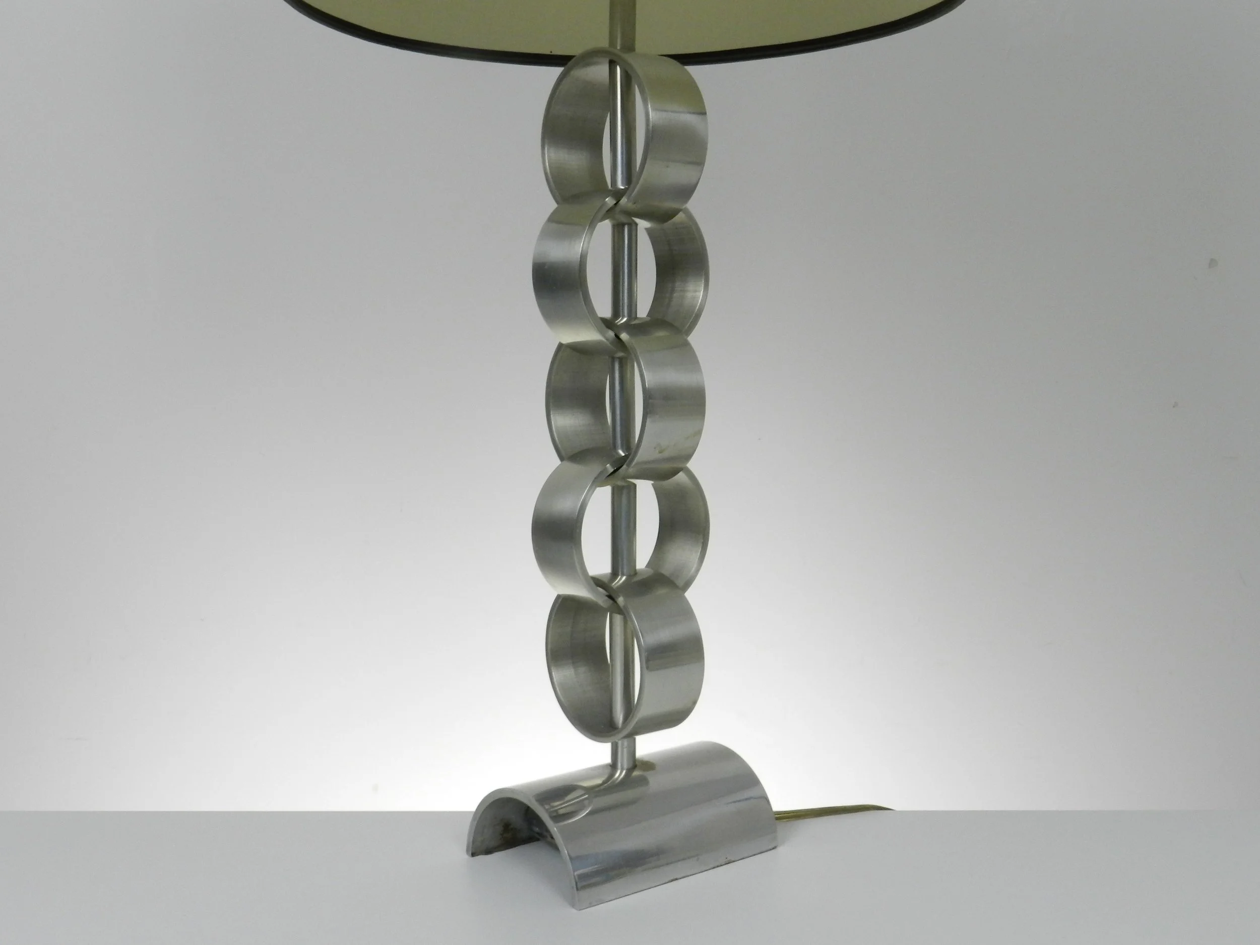 Modernist table in high quality polished aluminum.  France, 1970s.