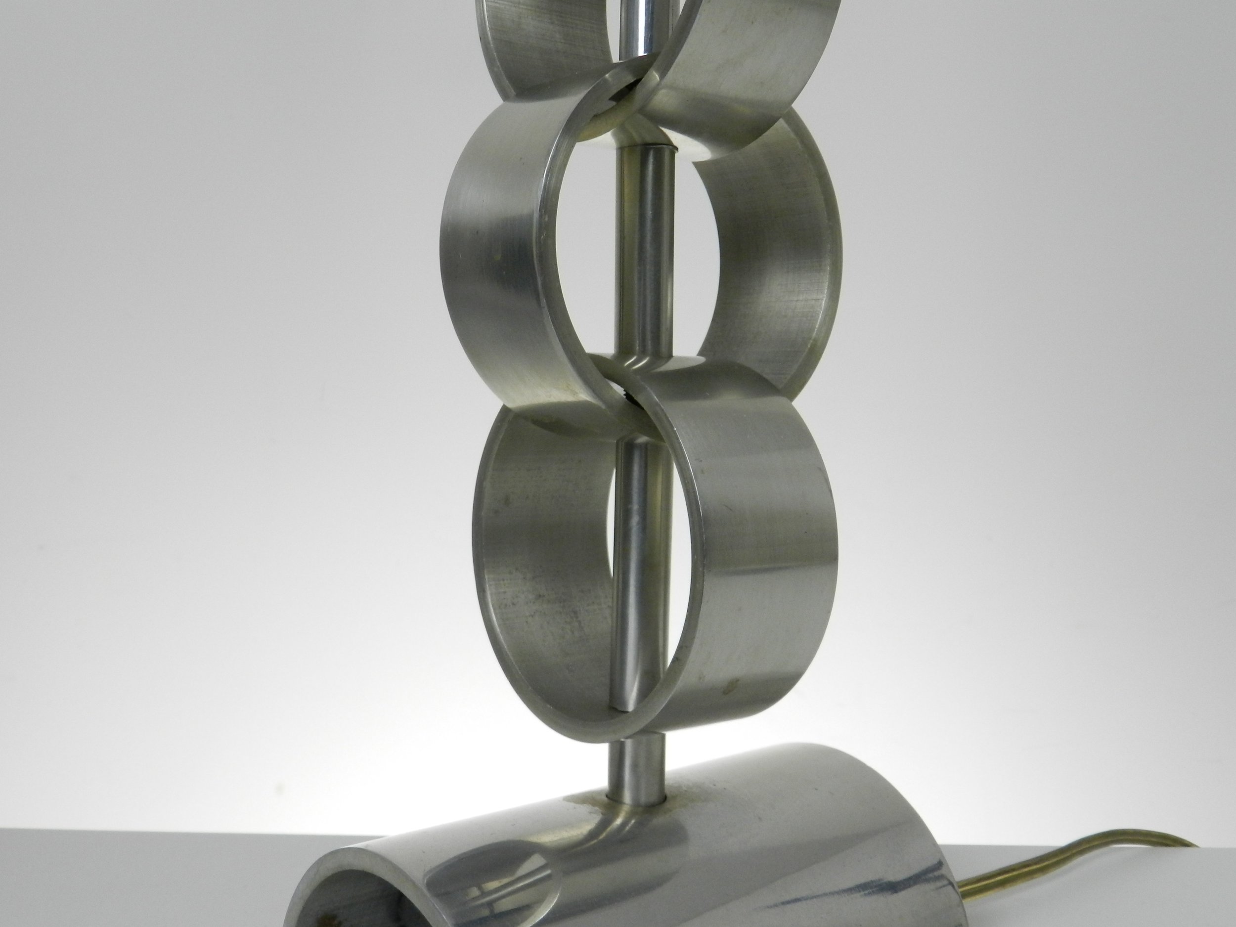 Modernist table in high quality polished aluminum.  France, 1970s.