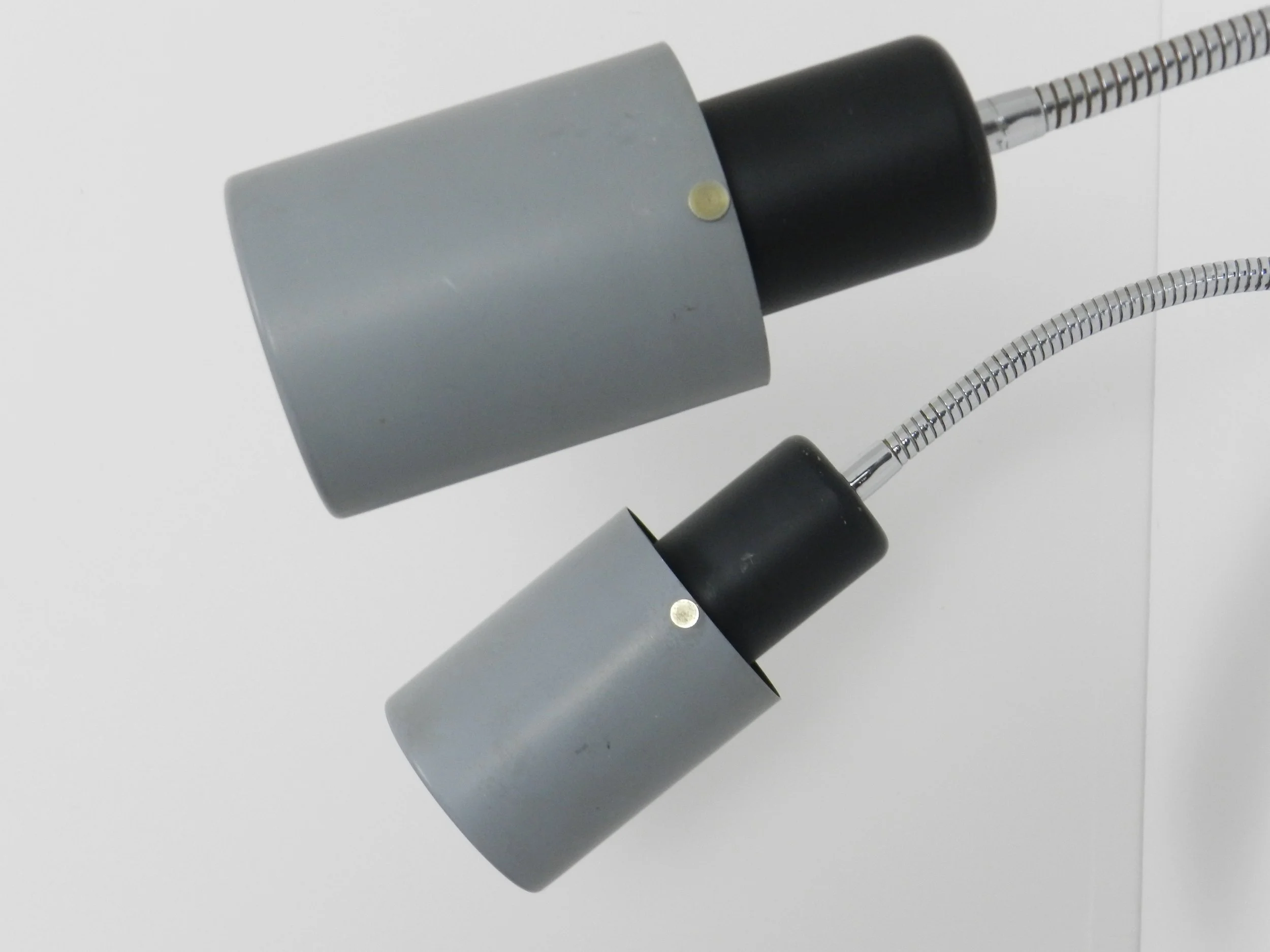 Pair of adjustable modernist wall lamps in painted metal and chrome.  Probably from France, 1960s.