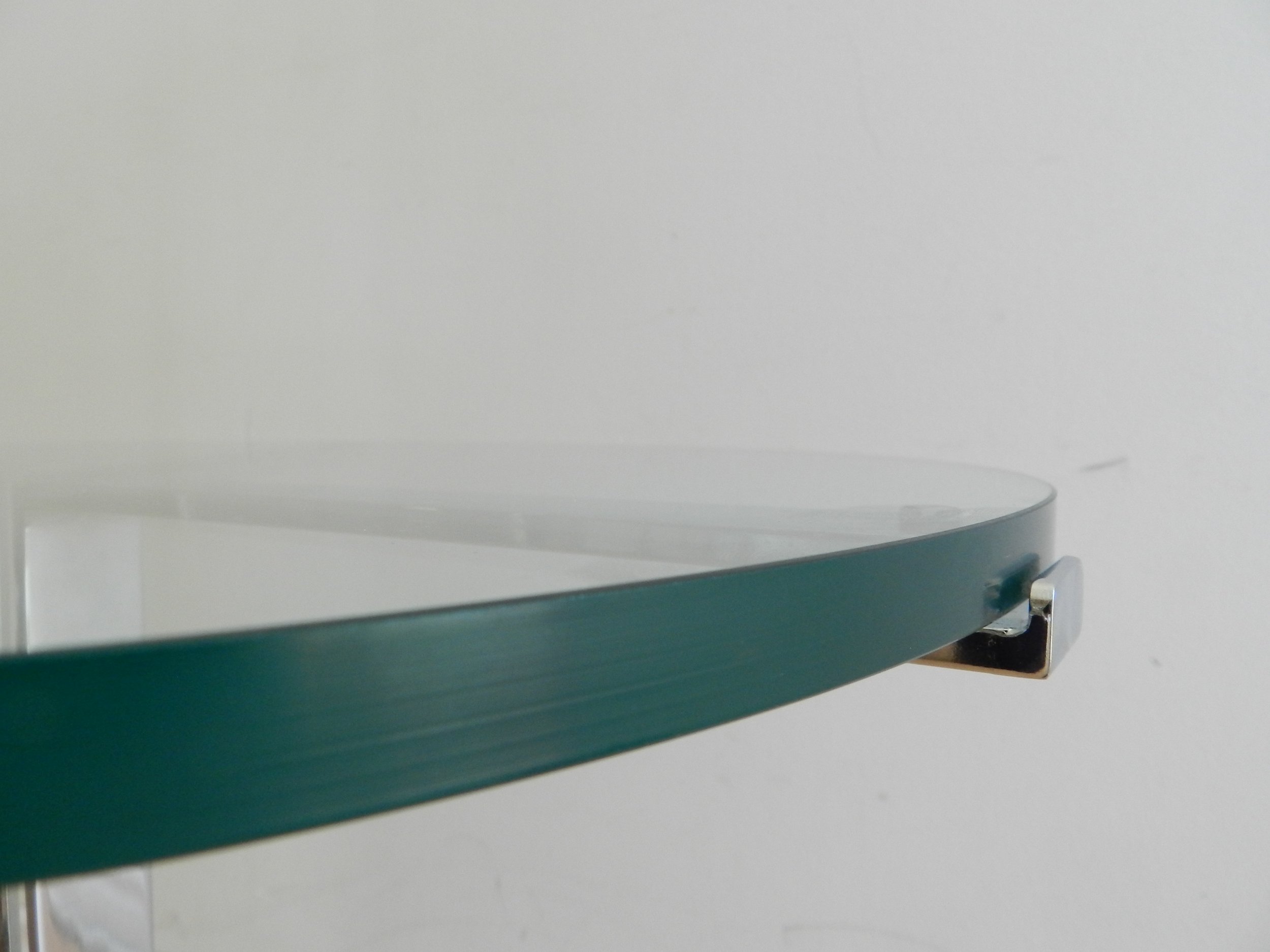 Pair of “Alpha” side tables in chromed steel with glass tops. Designed by Hans Eichenberger for Stendig.  Switzerland, 1970s.