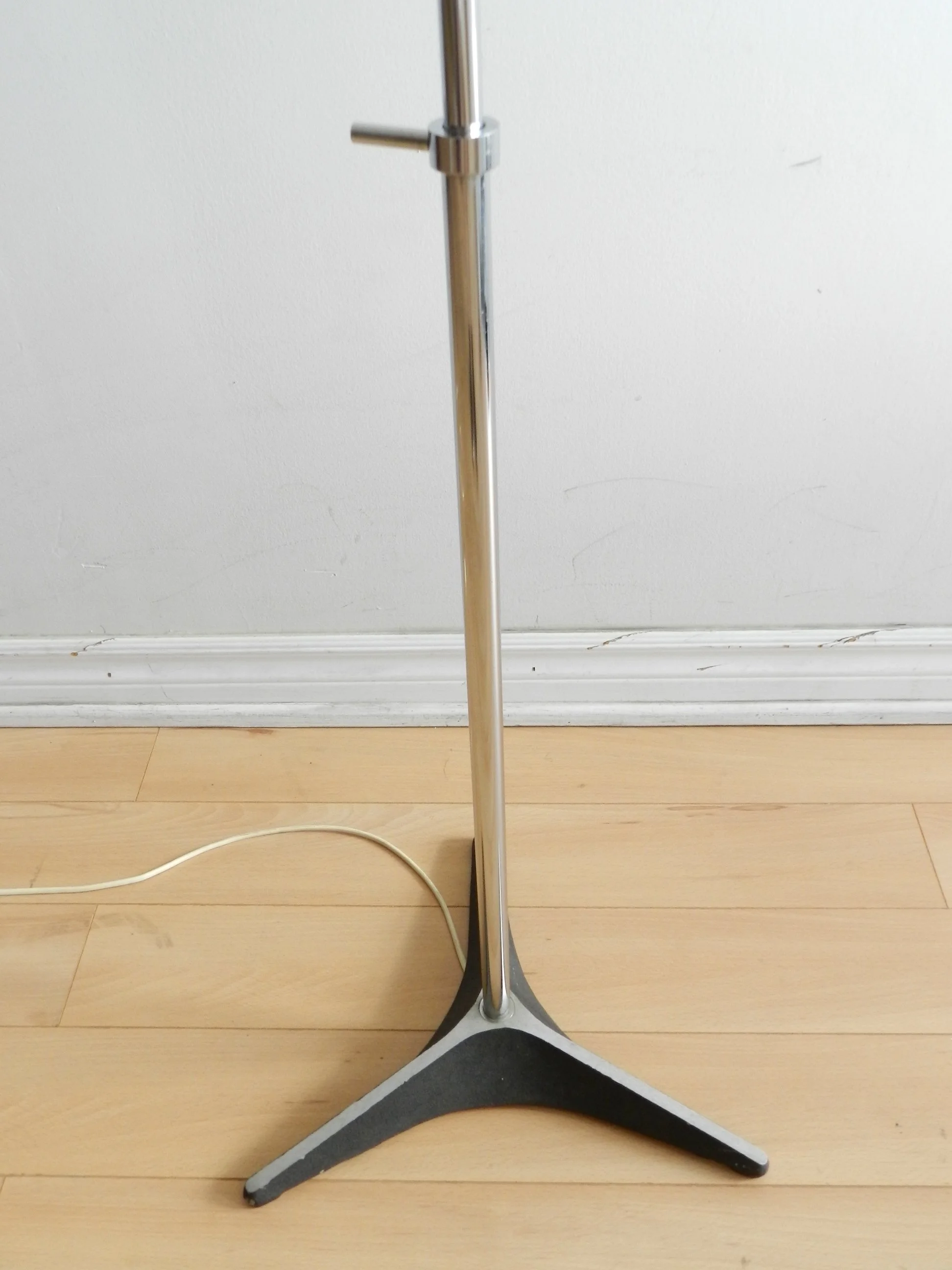 Chrome and glass floor lamp designed by Frank Ligtelijn for Raak.  Netherlands, 1960s.